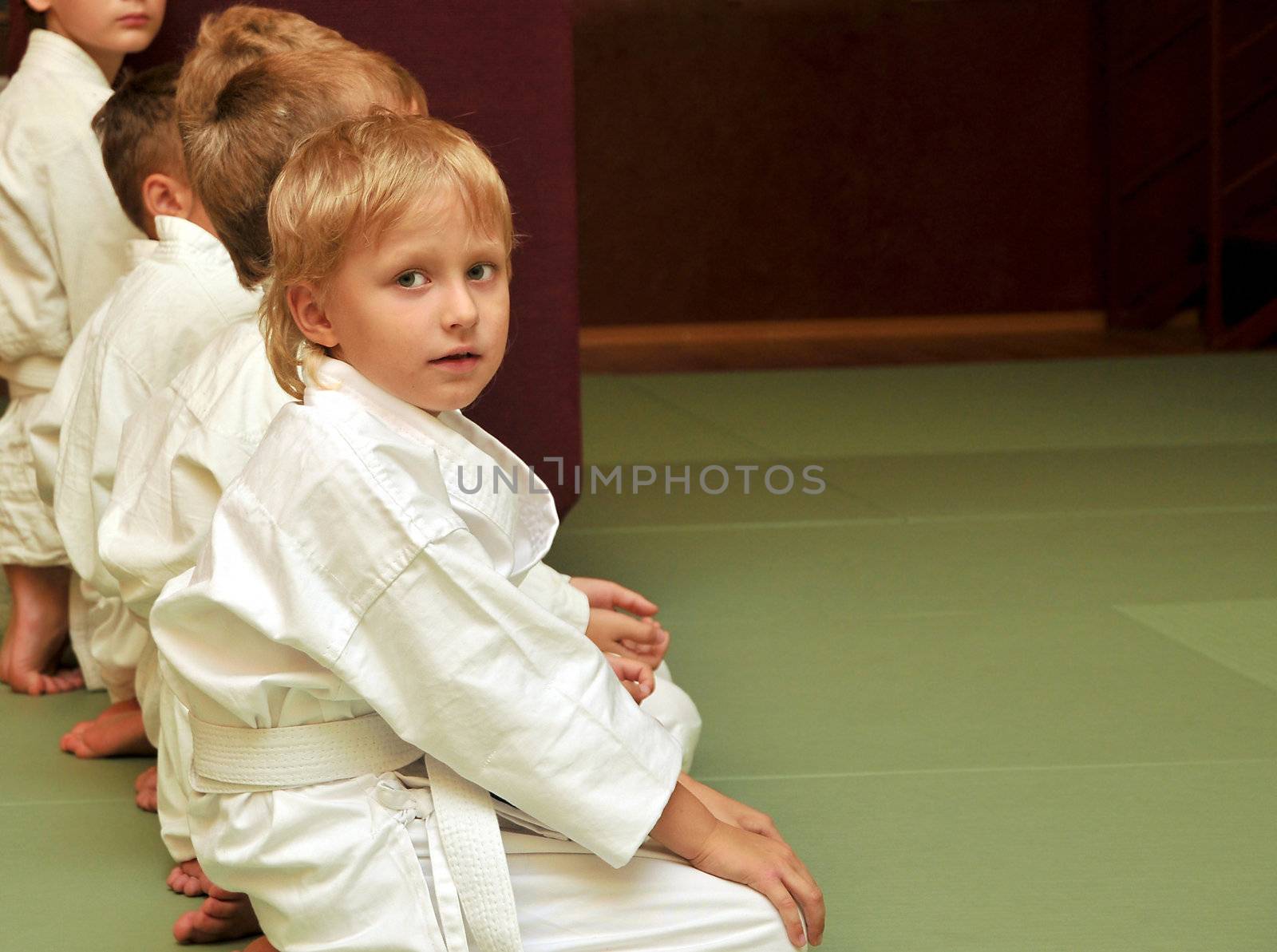 boys in sport hall, they are waitng for 	 competition