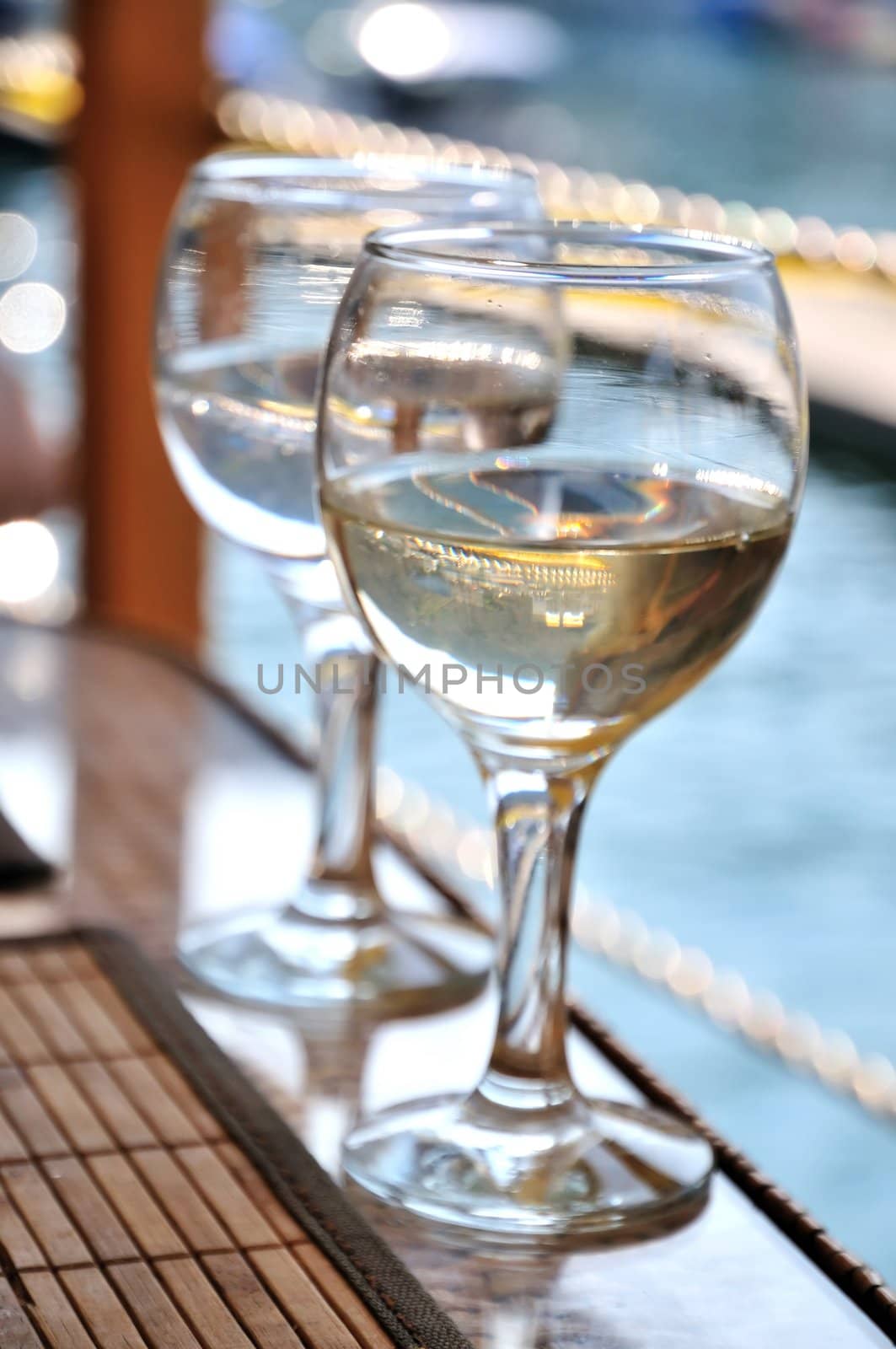 two glasses  with cold water   on the table in the water restaurant 