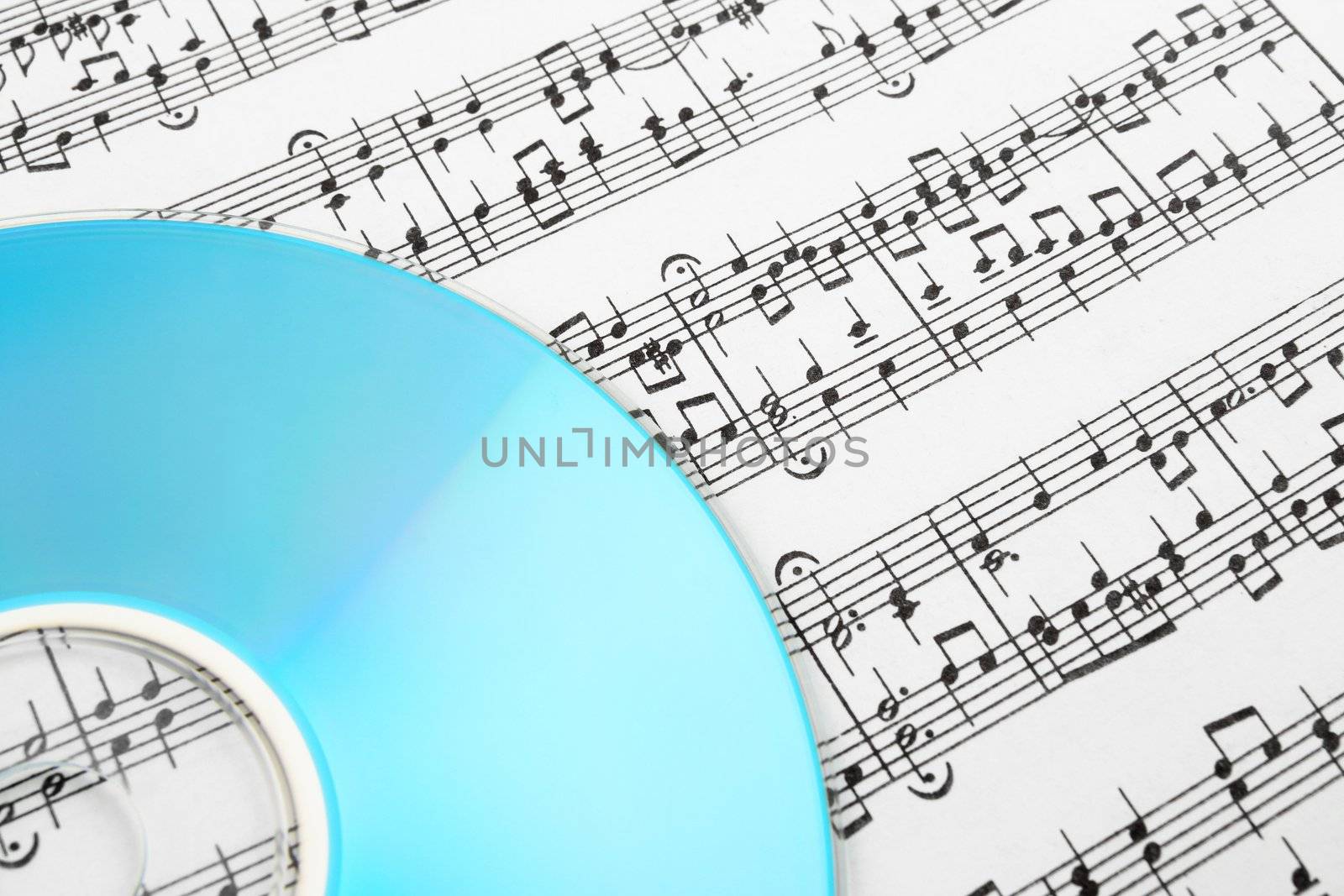 Blue CD or DVD and music notes. Digital music concept.