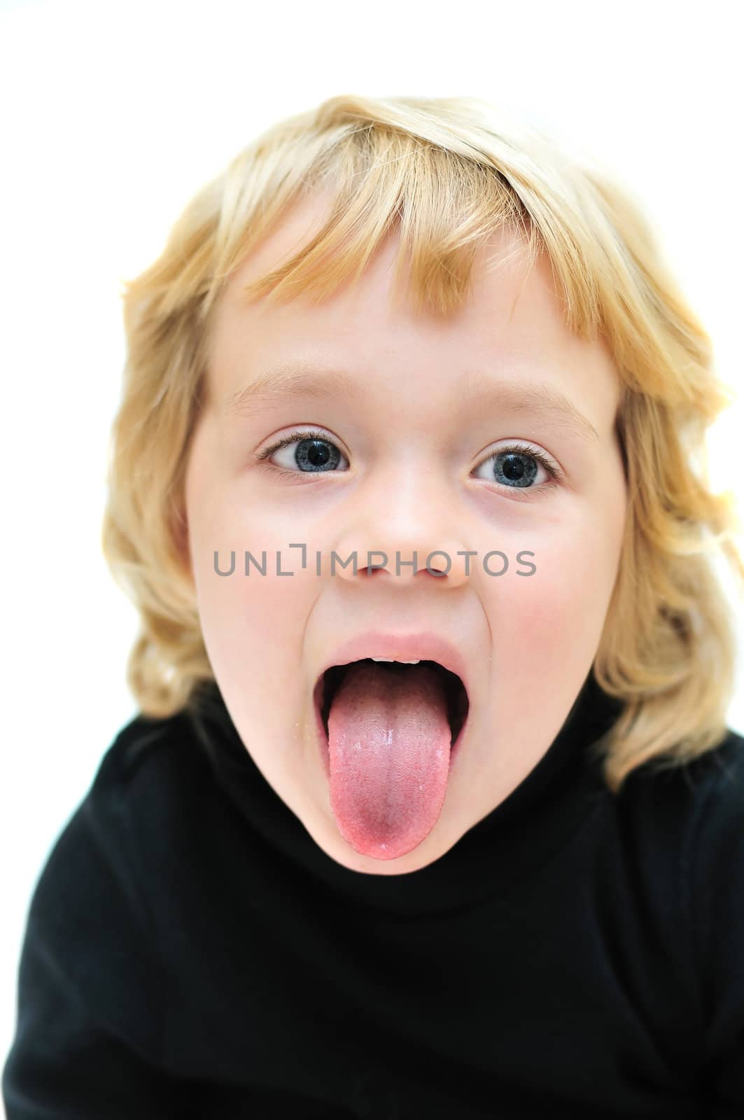 little cute girl showing her tongue out