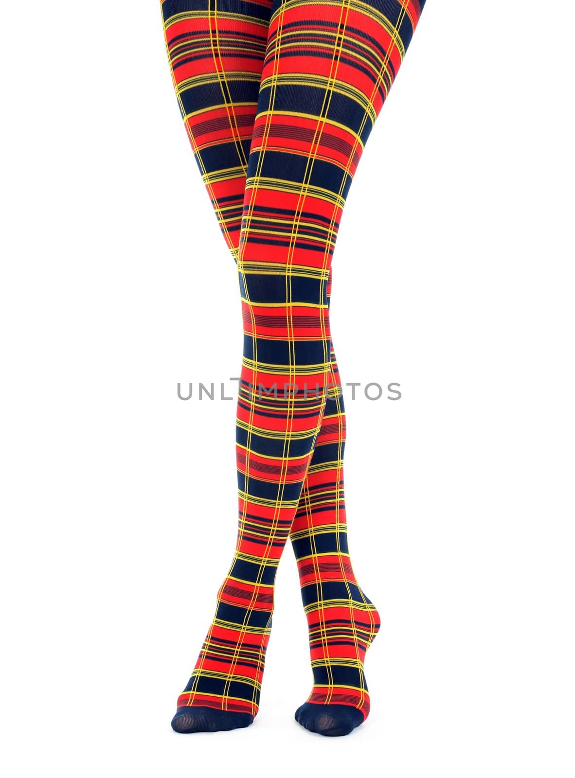Legs in multicolored fancy tights on white background.