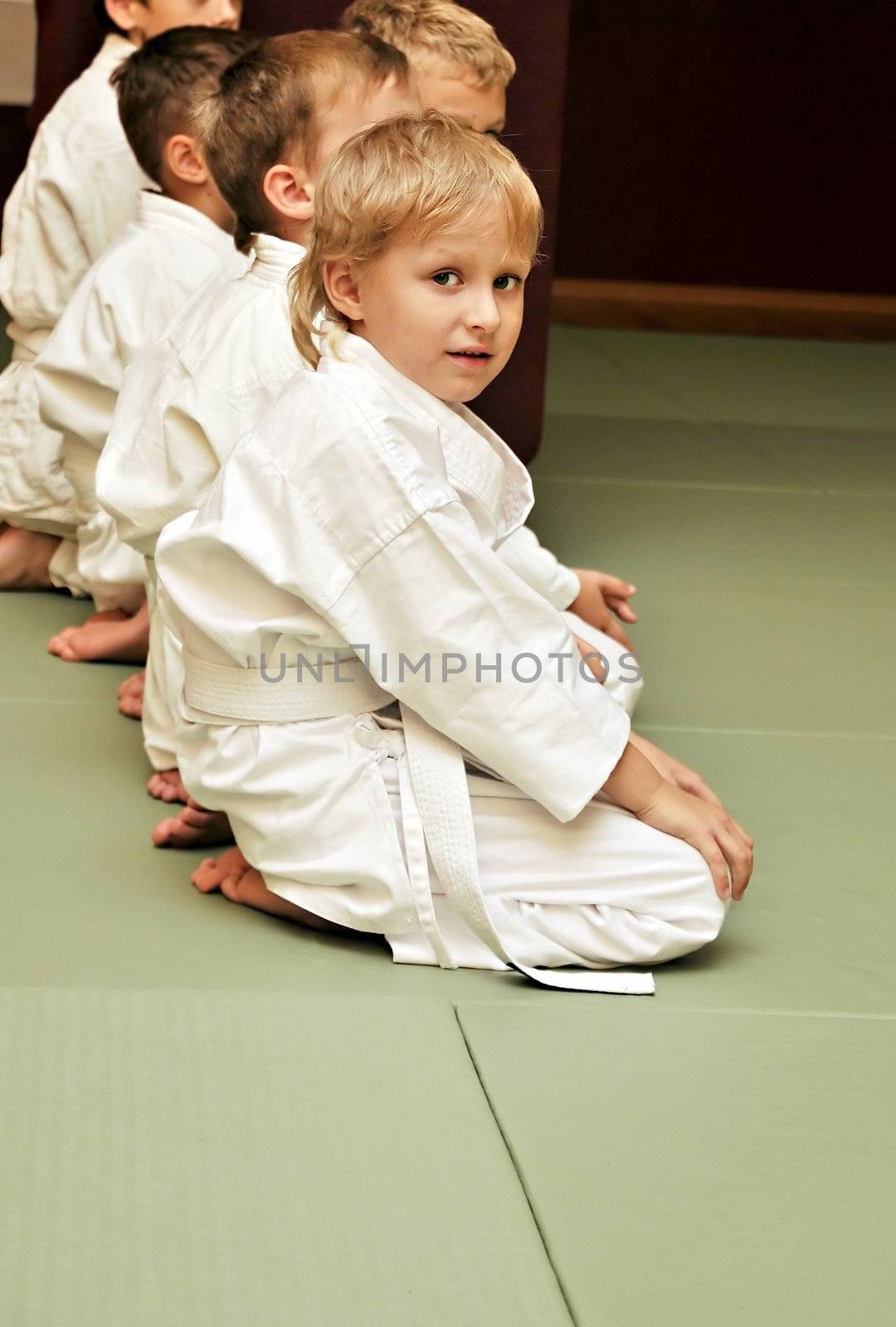 boys in sport hall, they are waitng for competition