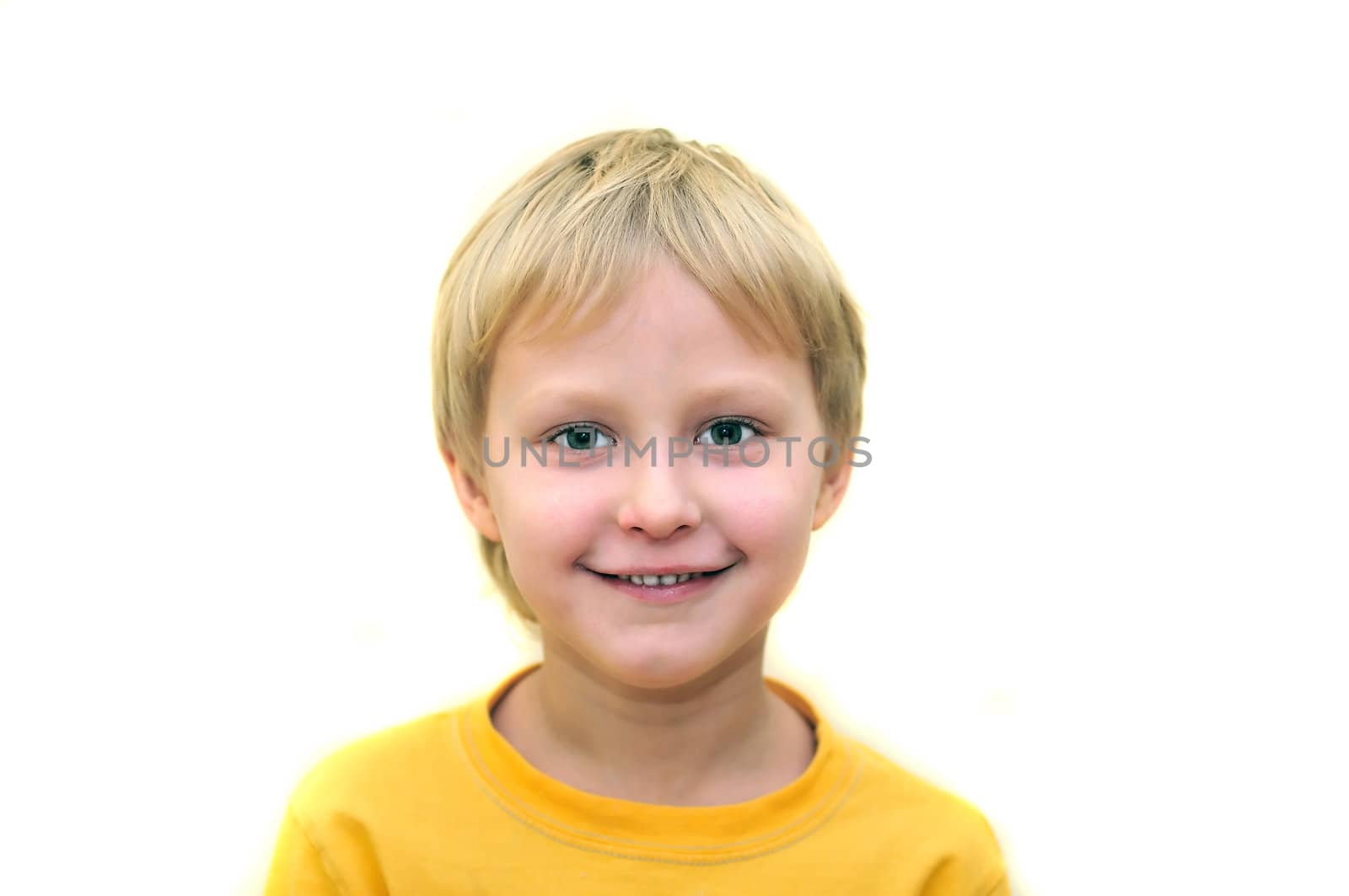 little adorable young boy  smiling over white
