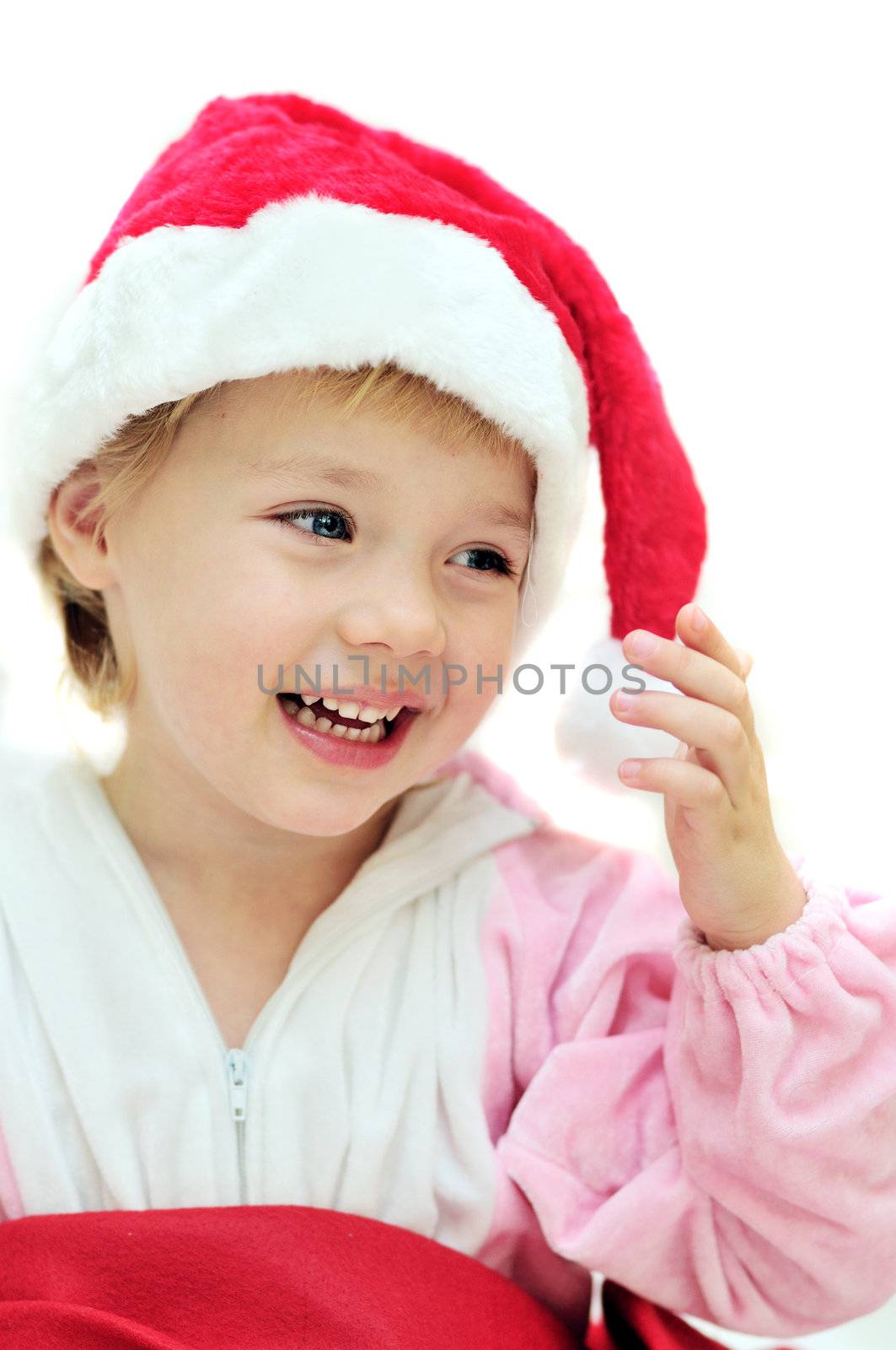 funny Santa girl smiling over the white 