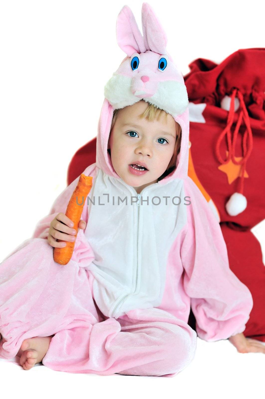  rabbit girl sitting near the bag with gifts