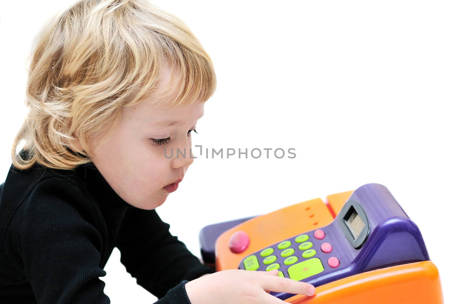 toddler girl playing with cash register over white.