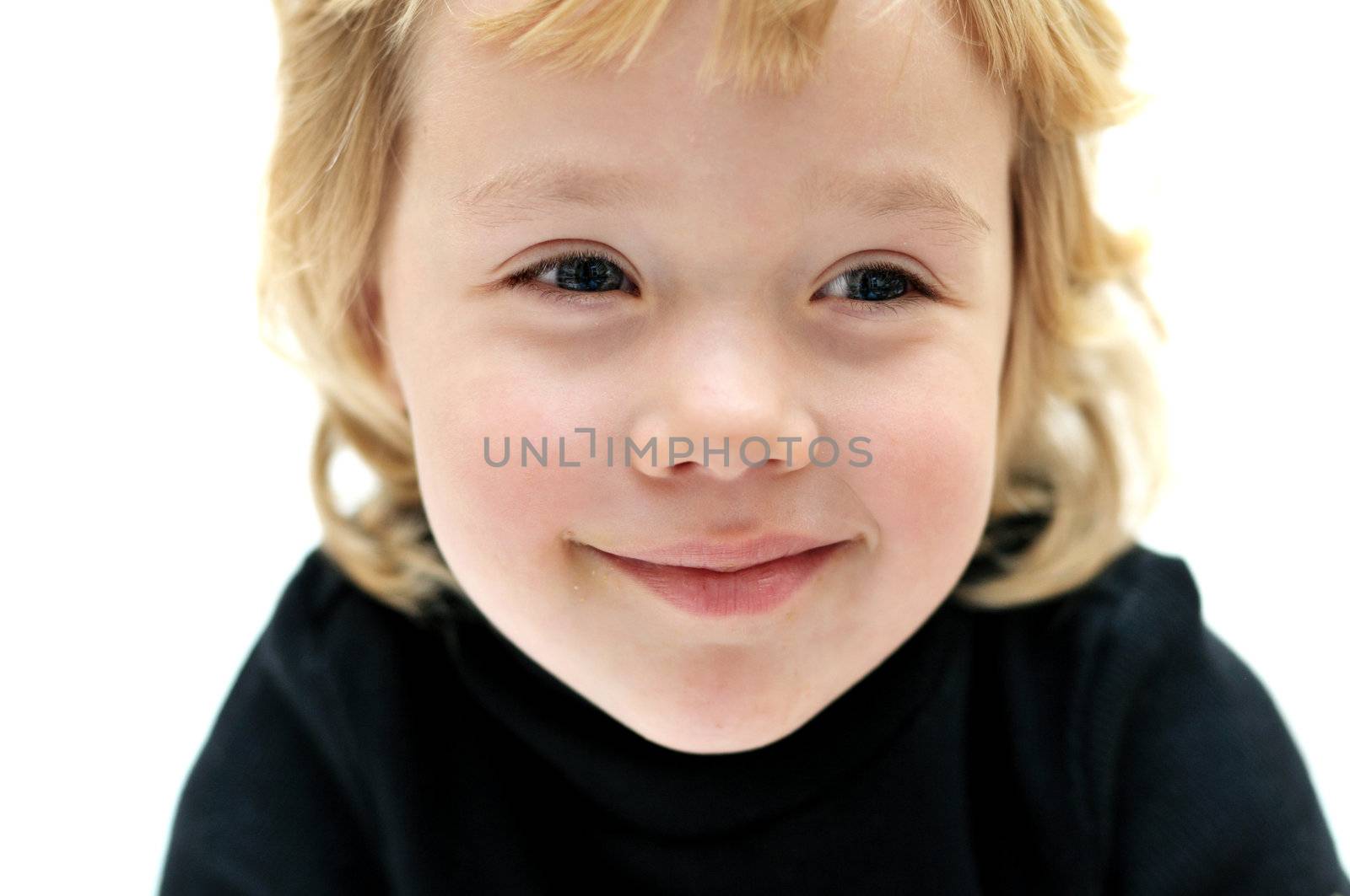 smiling blonde little girl over the white