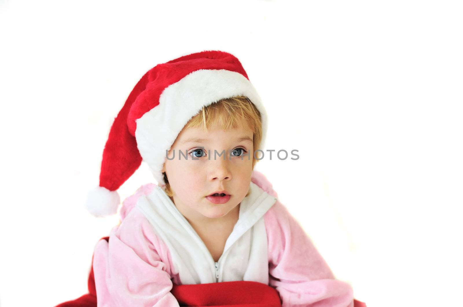 funny little Santa girl over the white