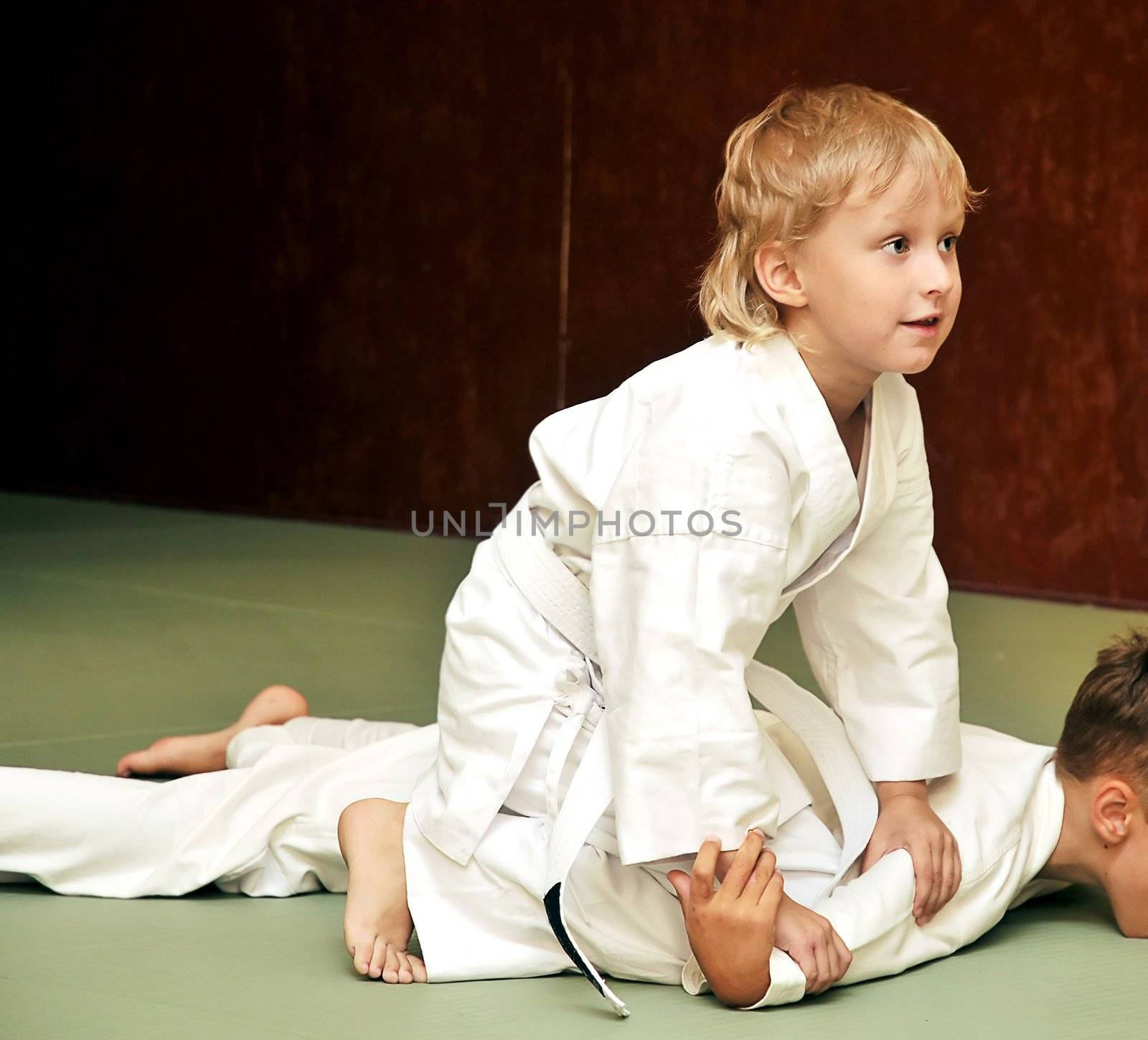 aikido boys are fighting for the competition
