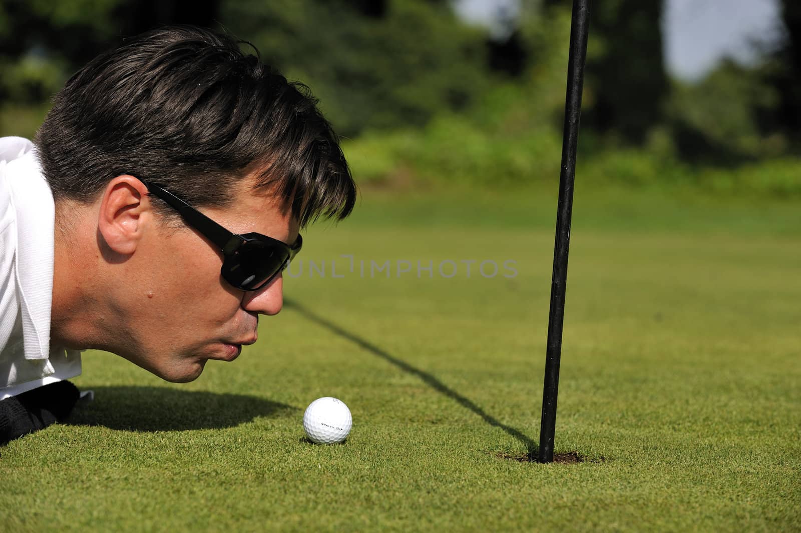 Man playing golf