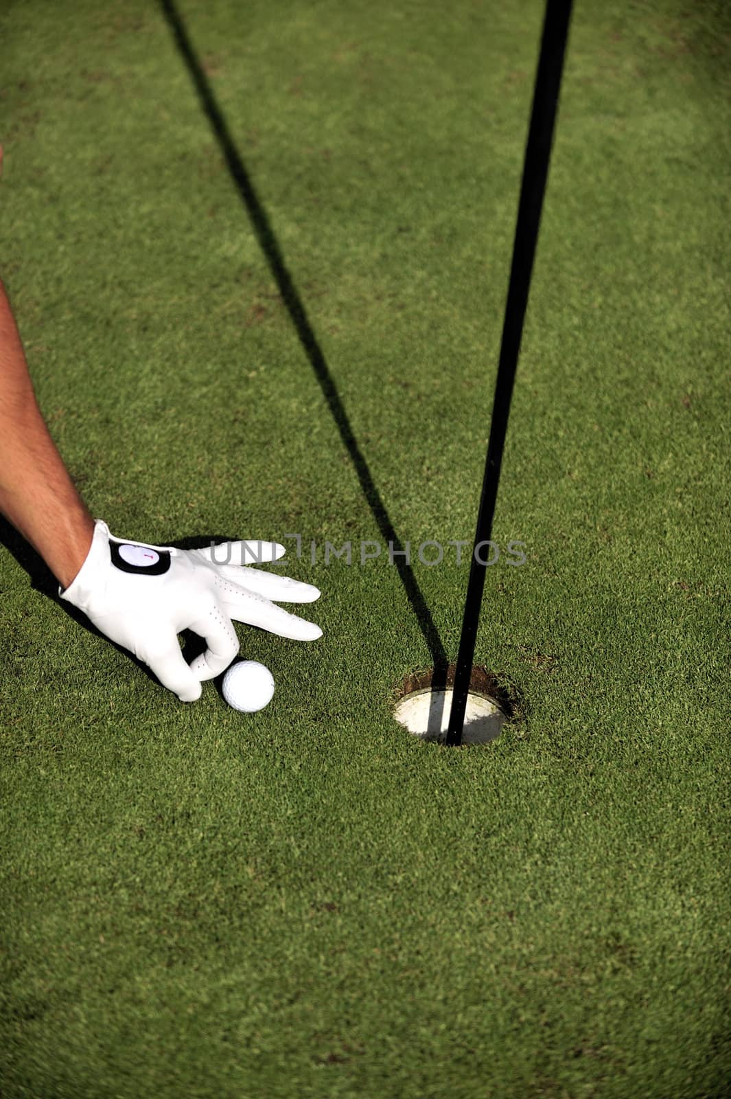 Man playing golf