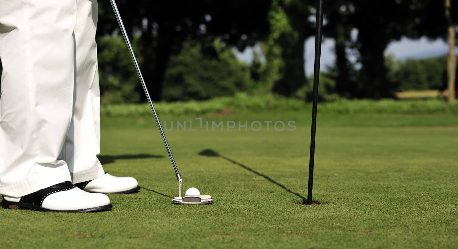 Man playing golf