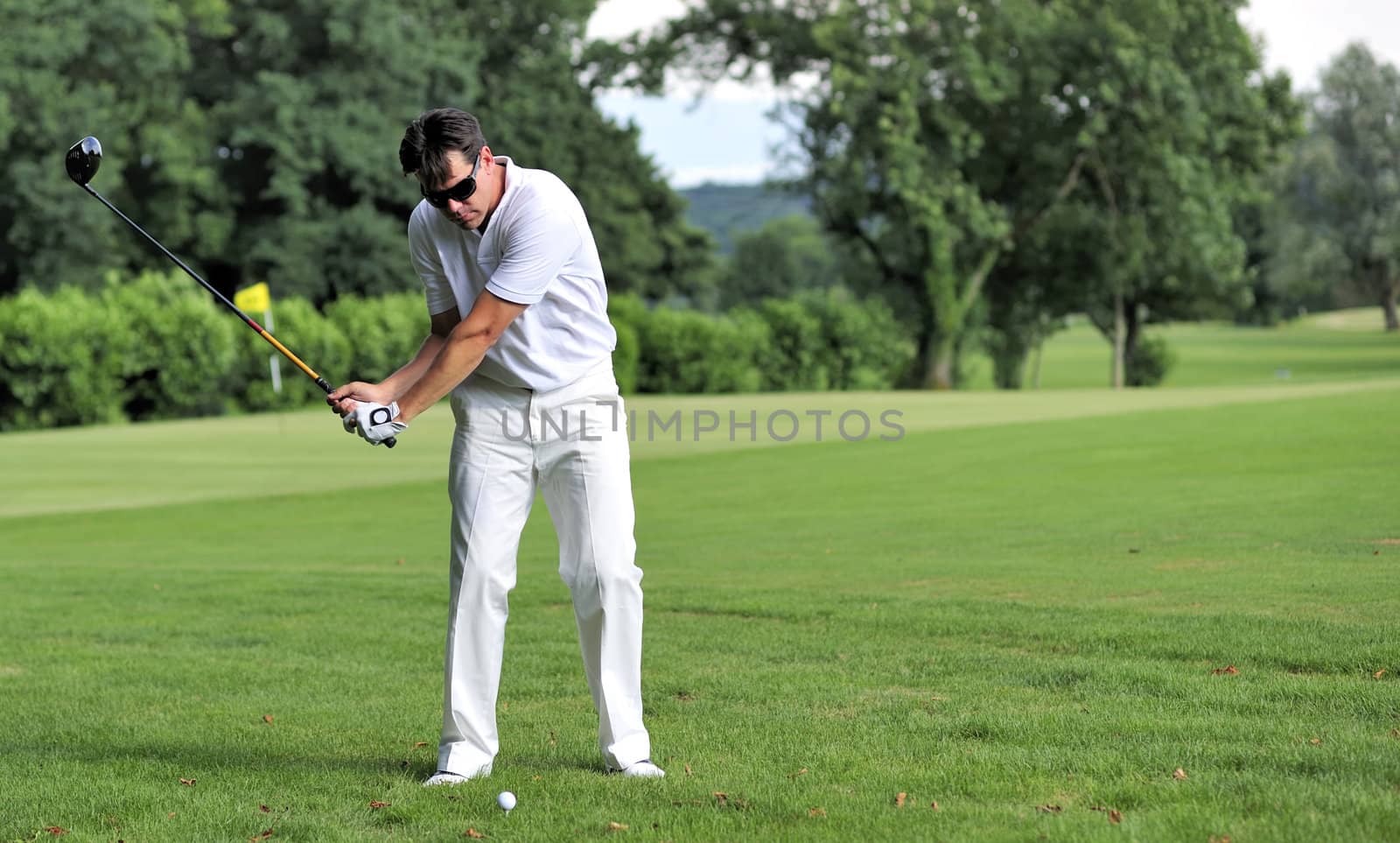 Man playing golf