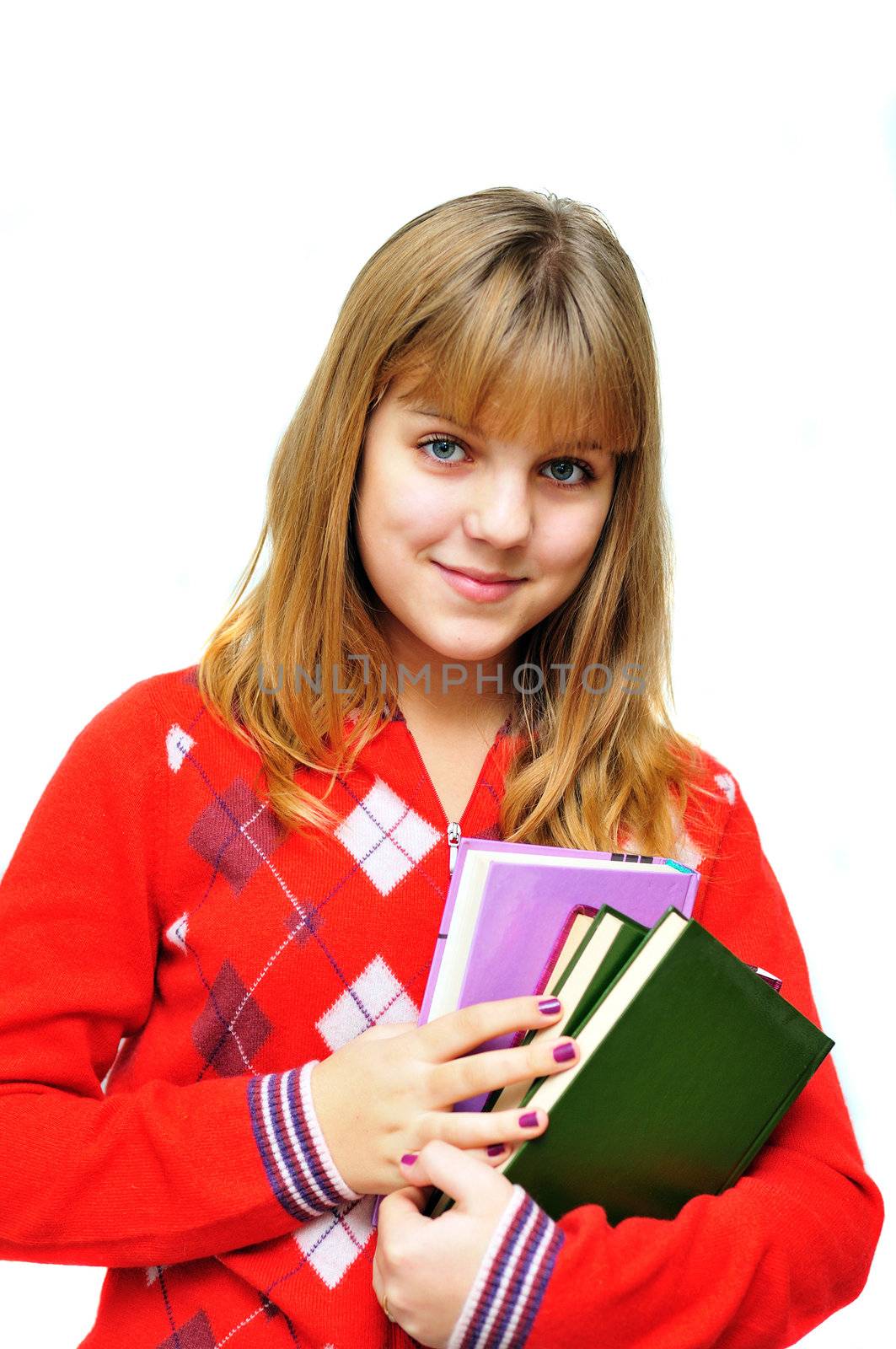pretty teen girl holding books over white
