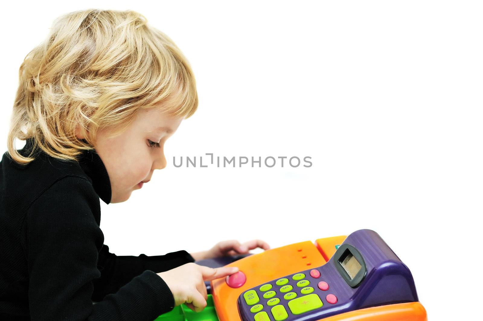 toddler girl playing with cash register over white.