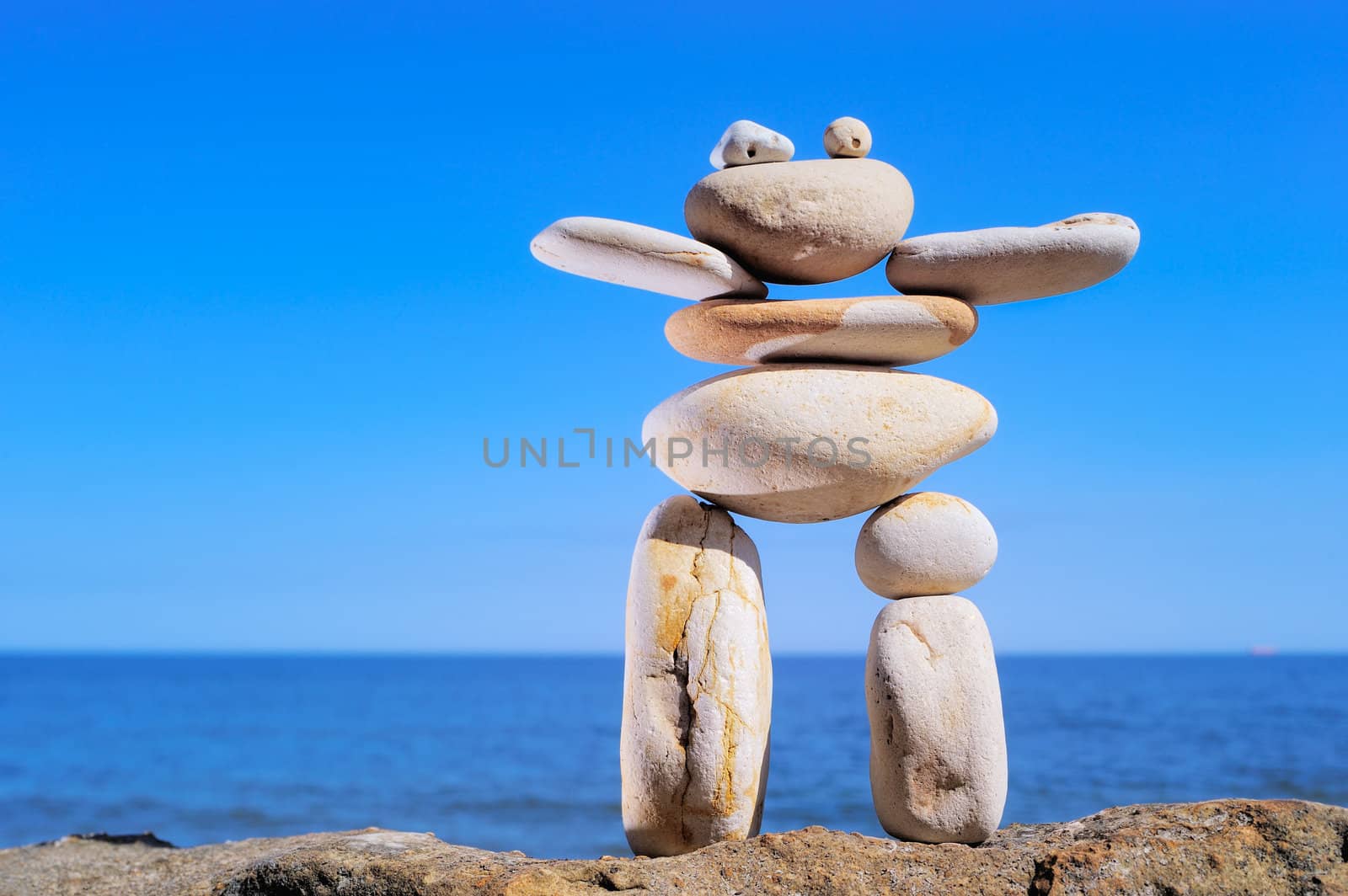 Image of stone idol on the sea shore