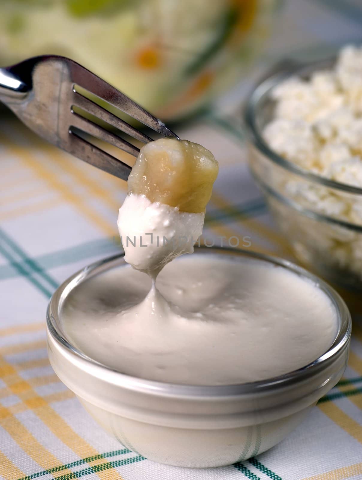 Lithuanian tradition curd dumplings with sour cream dip