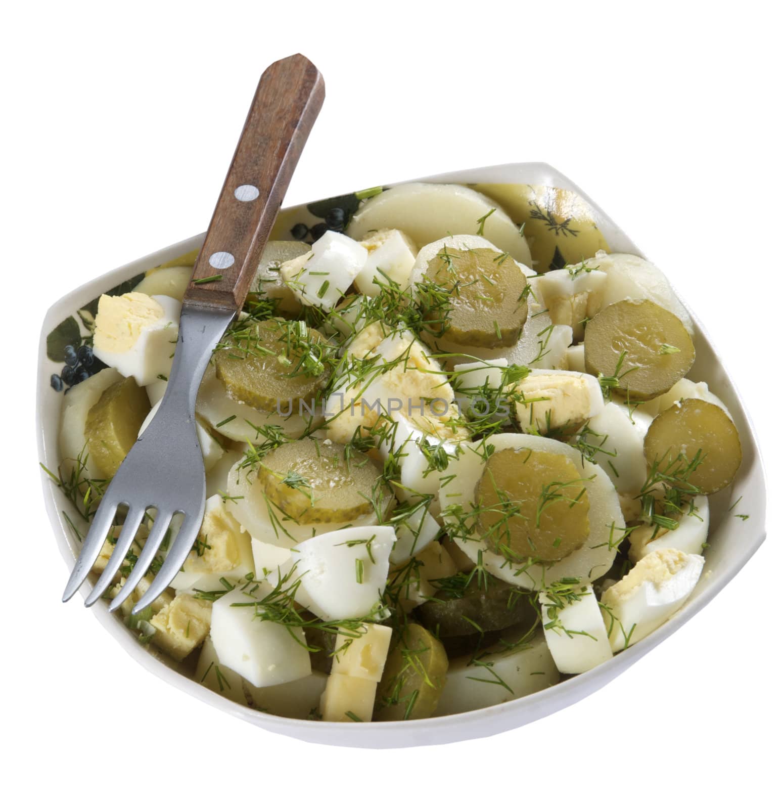 A plate of potato salad on white background