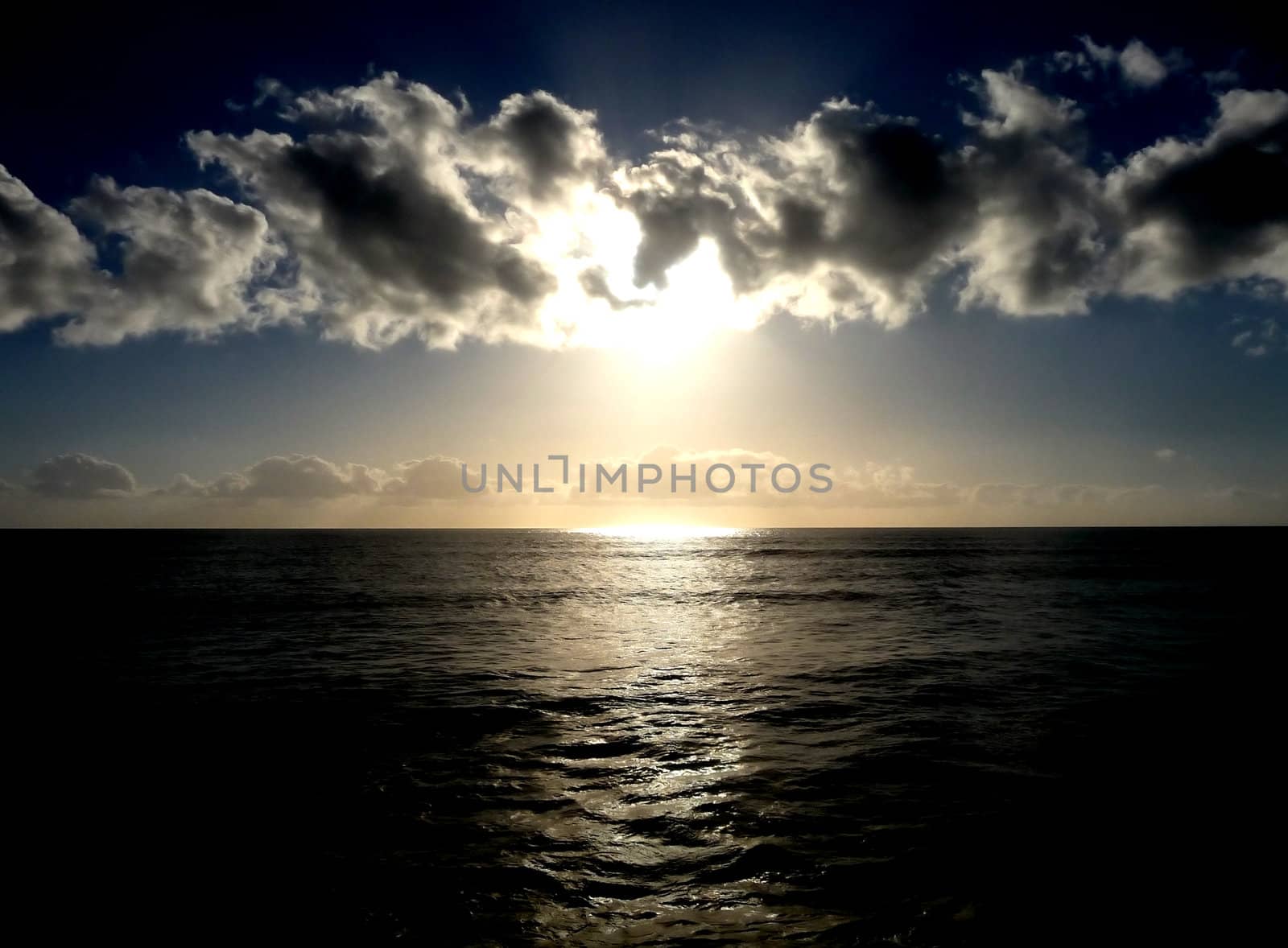A sunset over an oceanic view.