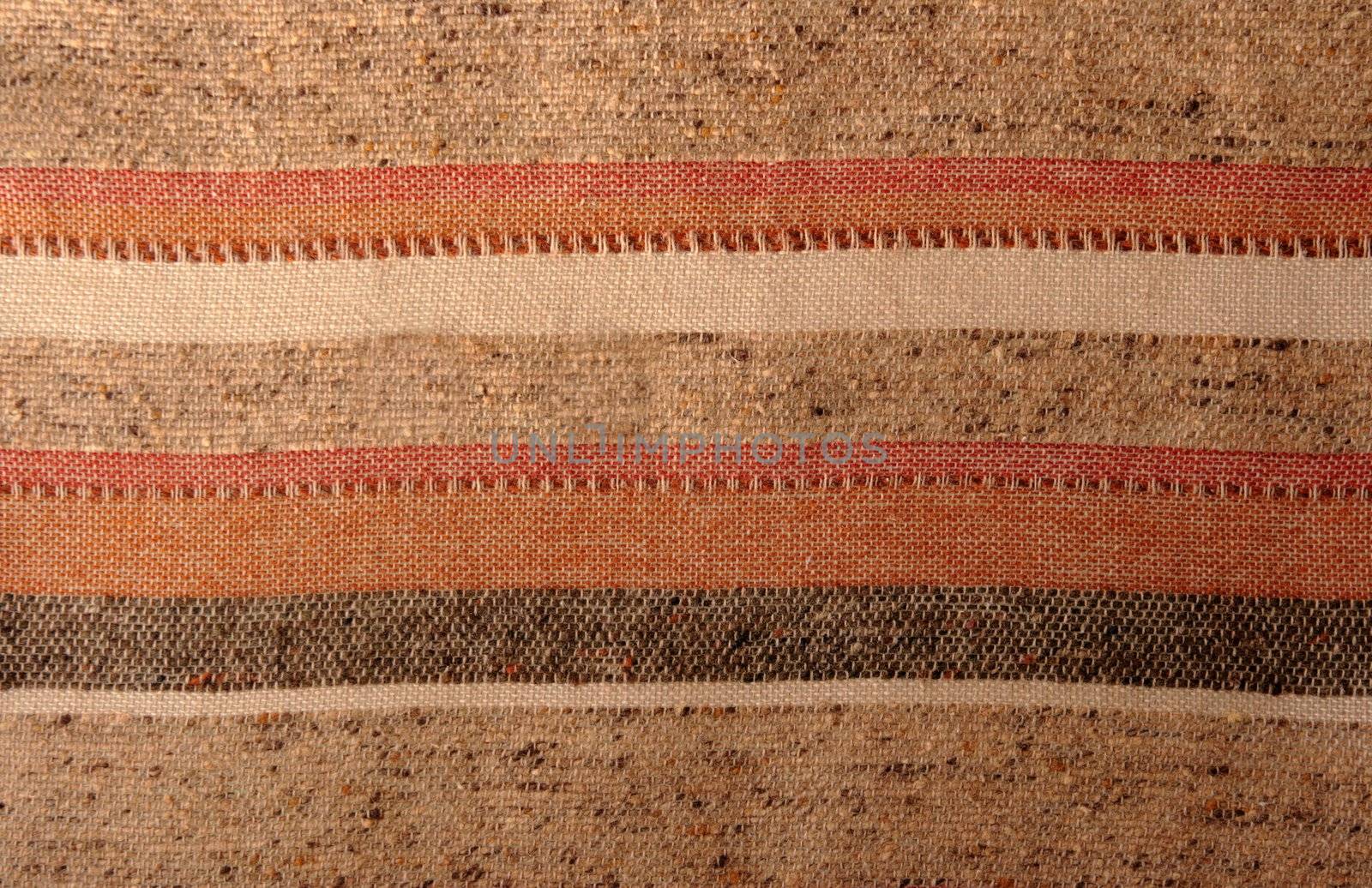 fabric background in neutral shades of brown, beige and rust