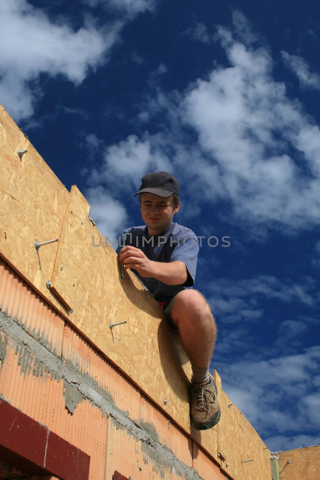 worker on the building, height