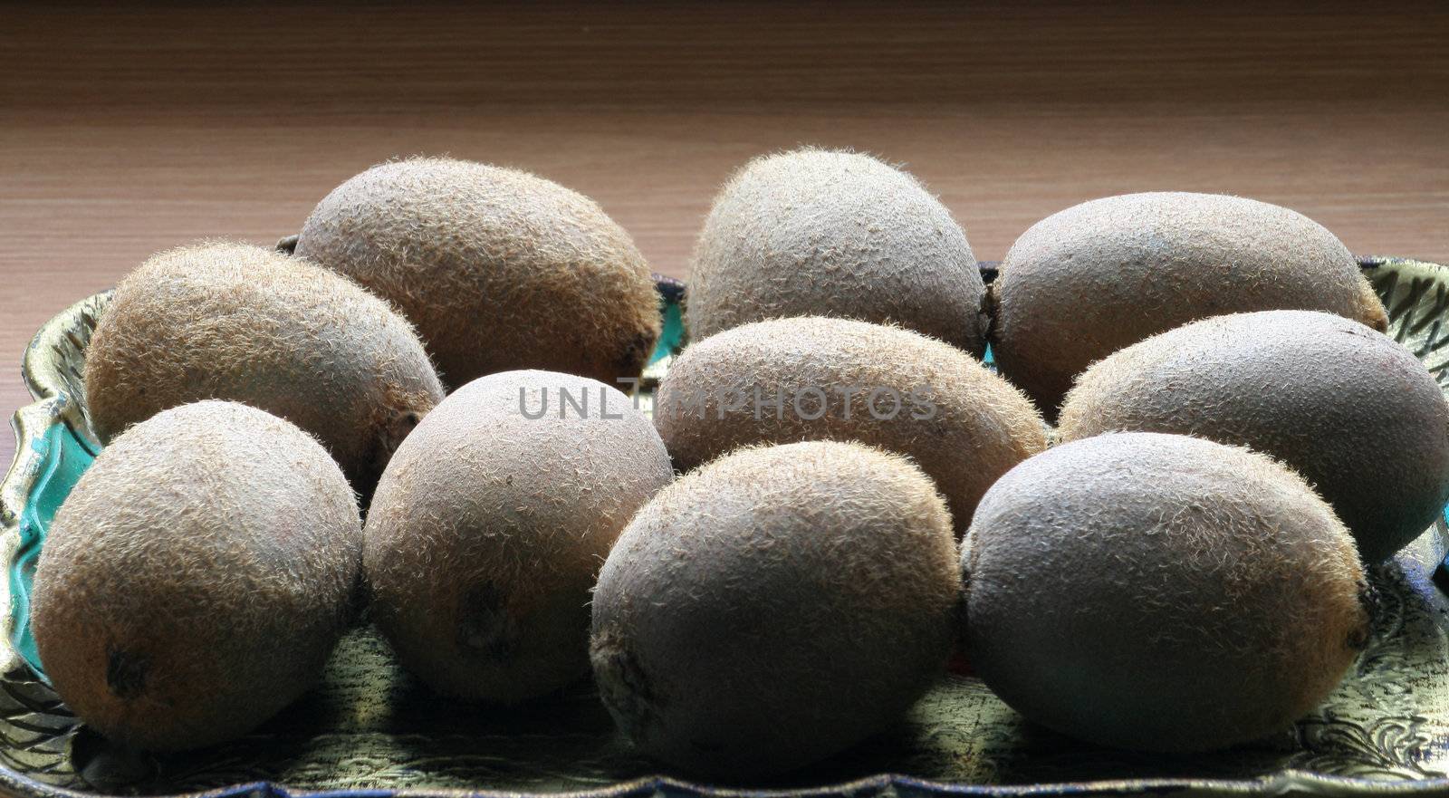 Some kiwi fruits on the plate