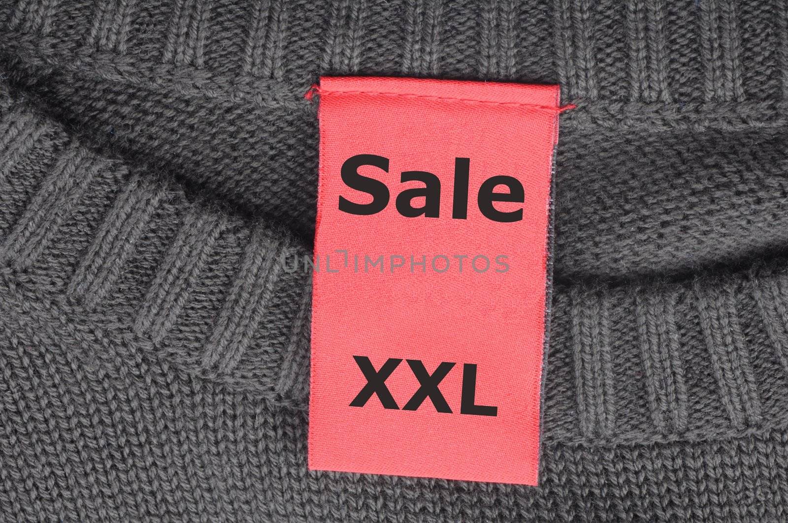 sale xxl on fashion label showing clothes discount concept