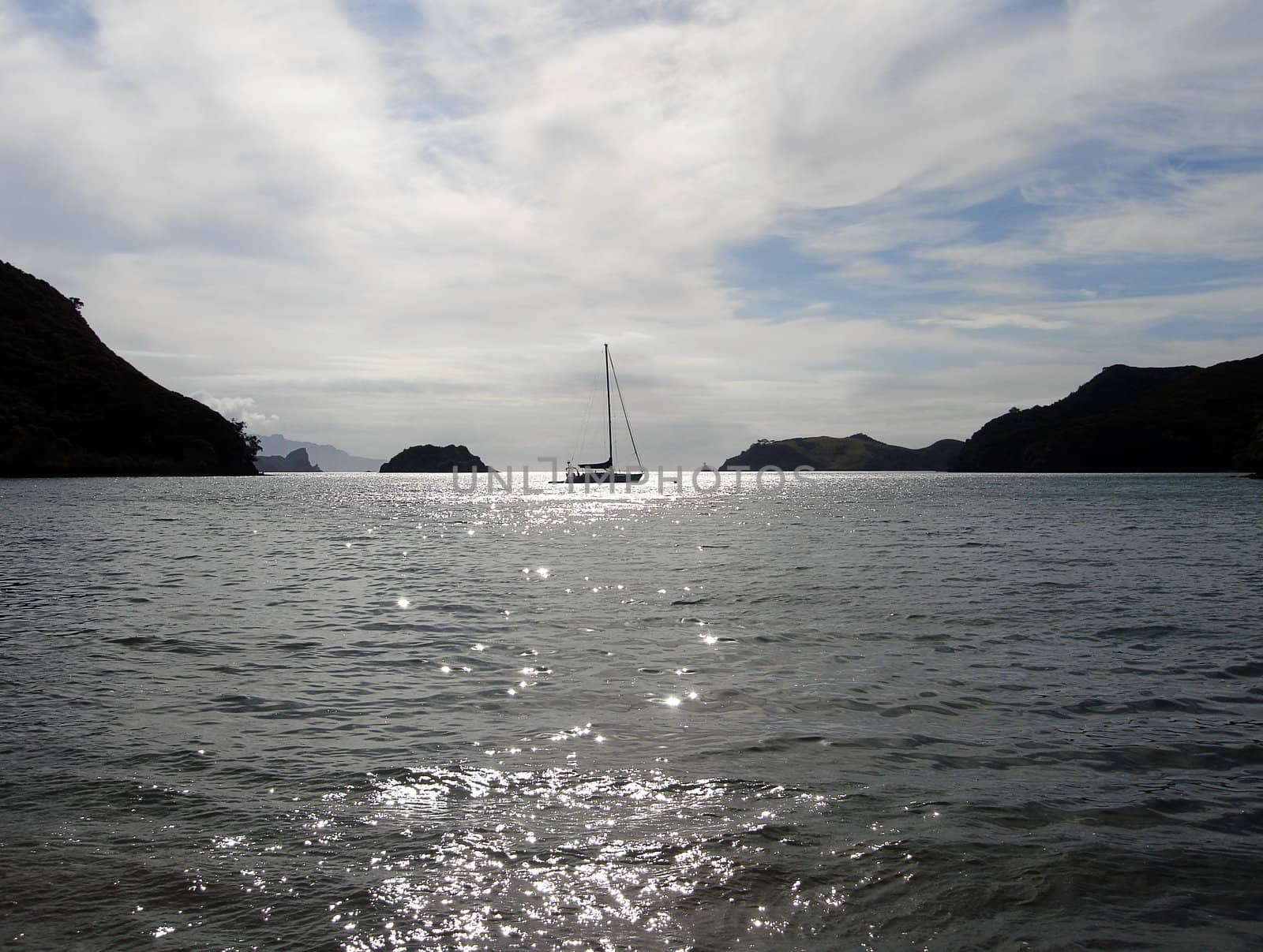 Sailboat in Silhouette.  Orama, Great Barrier Island, New Zealan by Cloudia