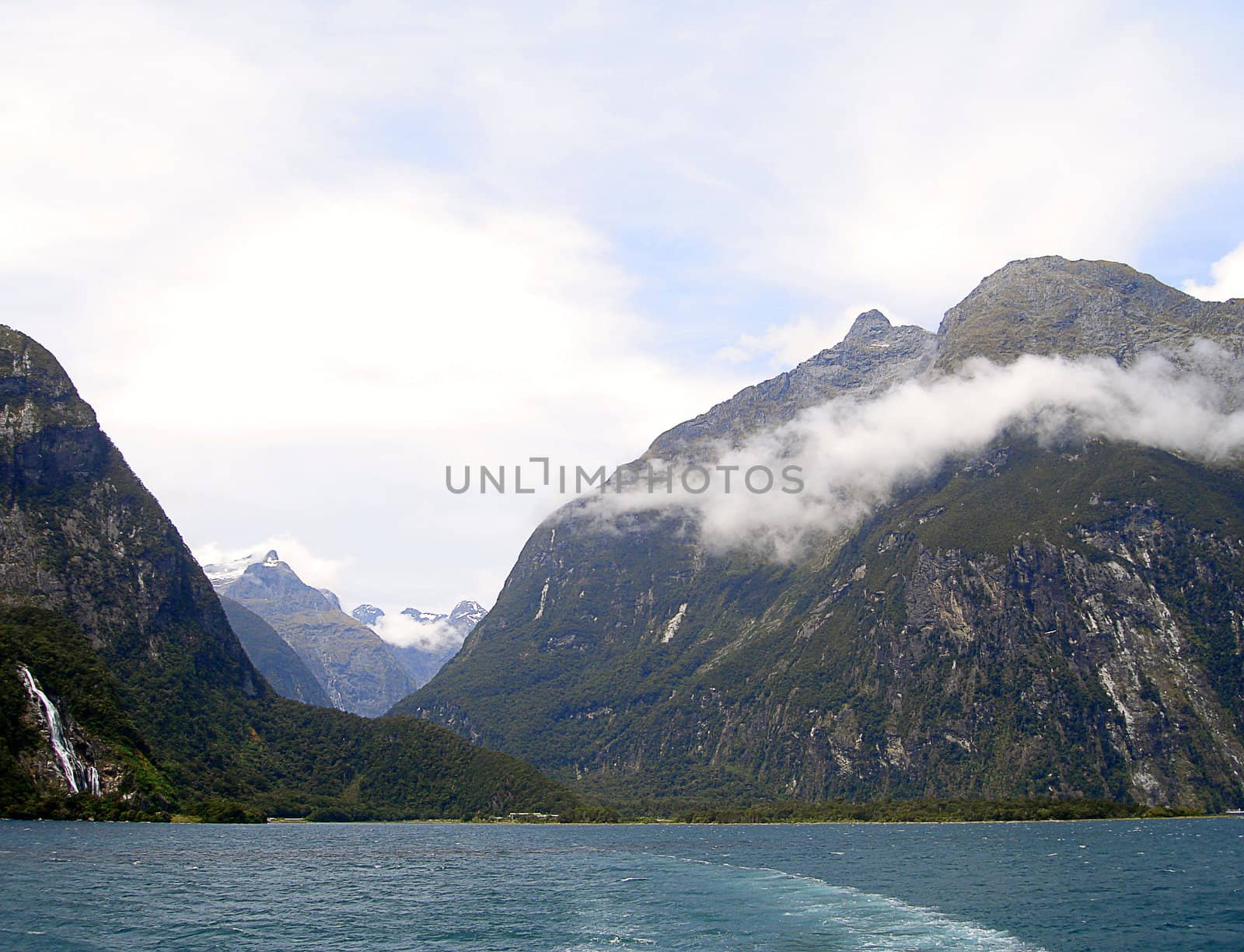 Mountains and Waterfalls within Milford Sound, New Zealand