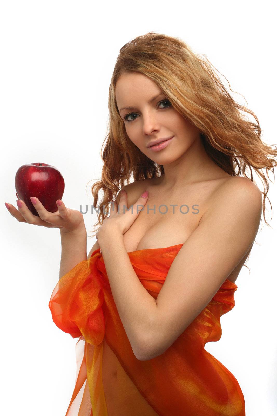 girl holding in her hand a red apple by skutin