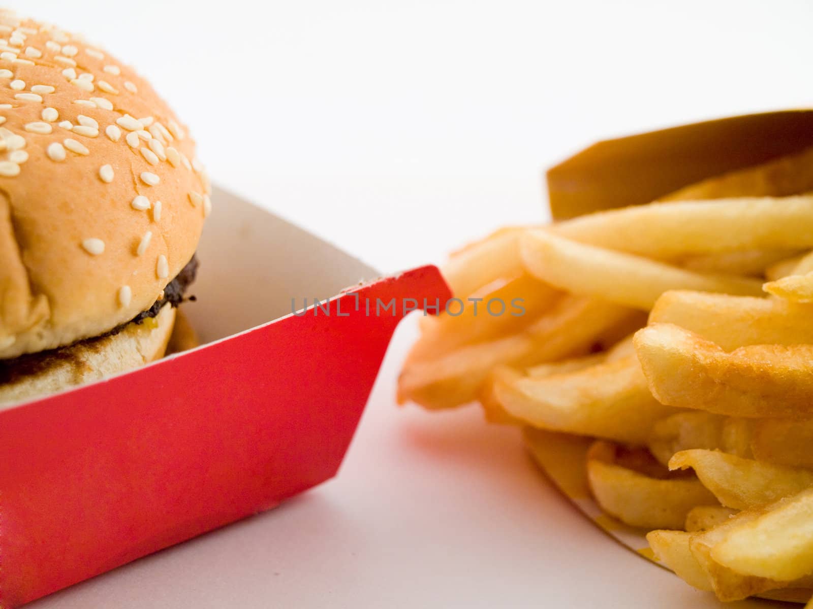 Burger and Fries in Cardboard Fast Unhealthy Food on White Background