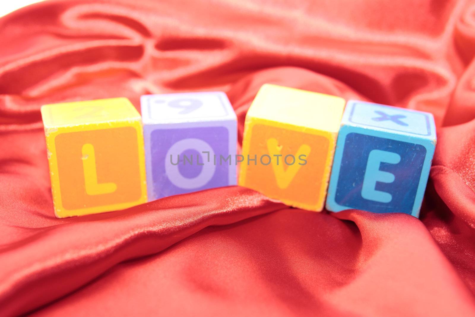 love written with blocks on a silk nightie