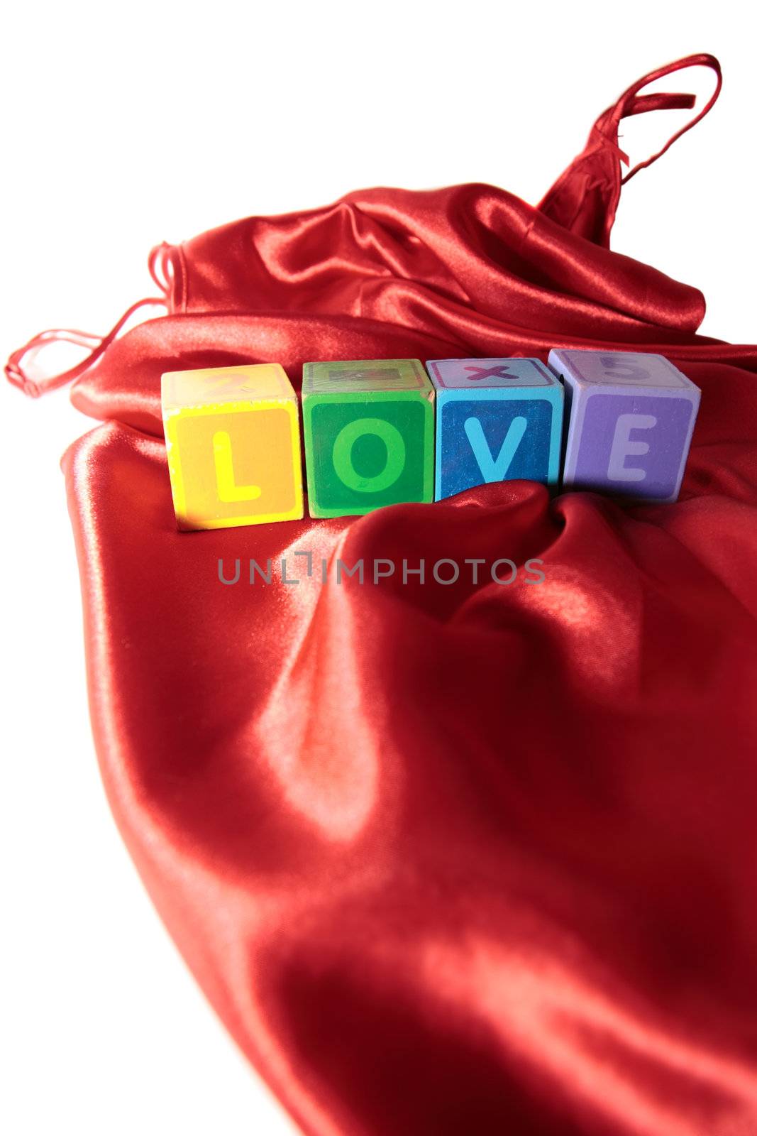 love written with blocks on a silk nightie