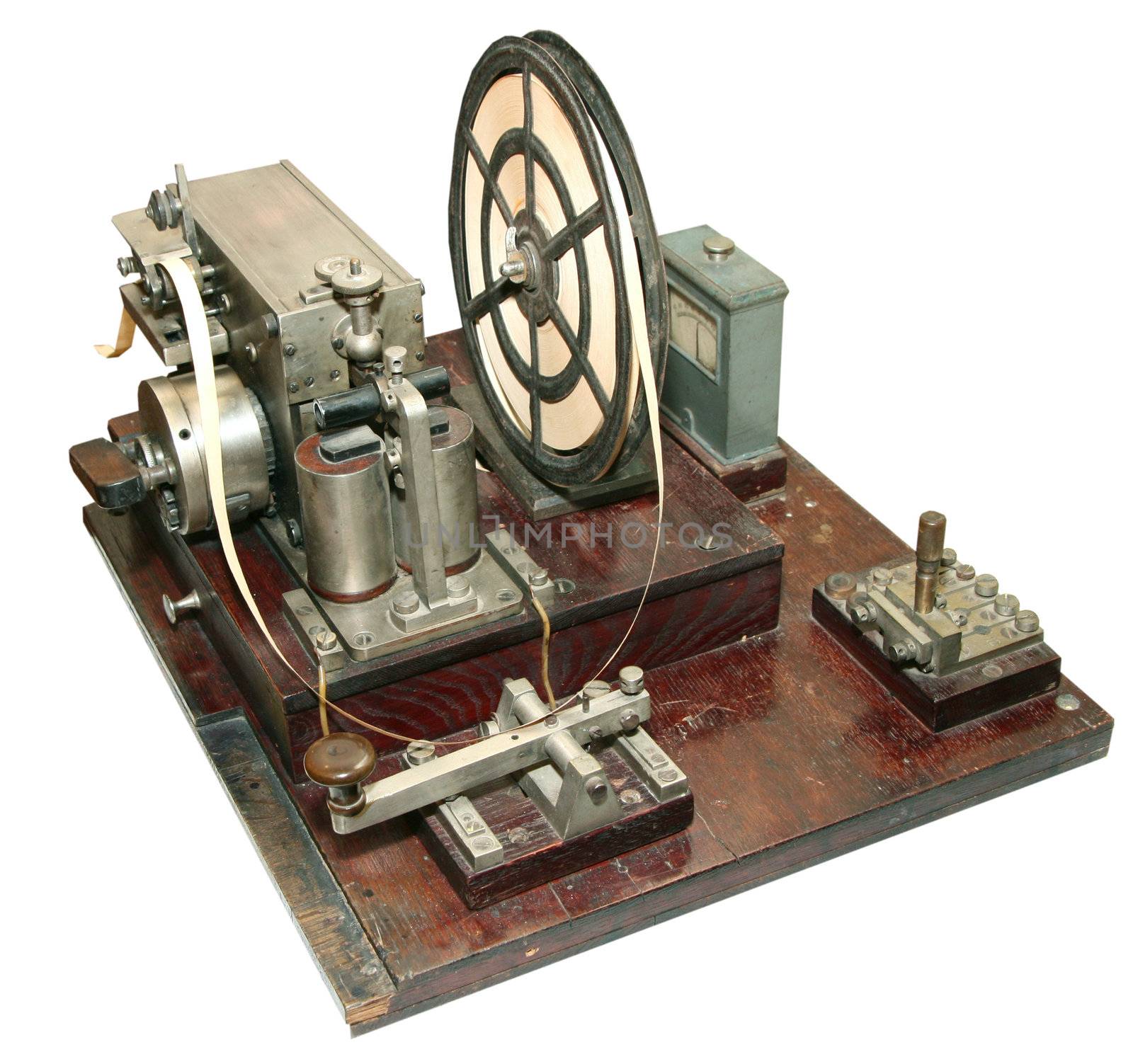 isolated obsolete vintage morse telegraph machine by fotosergio