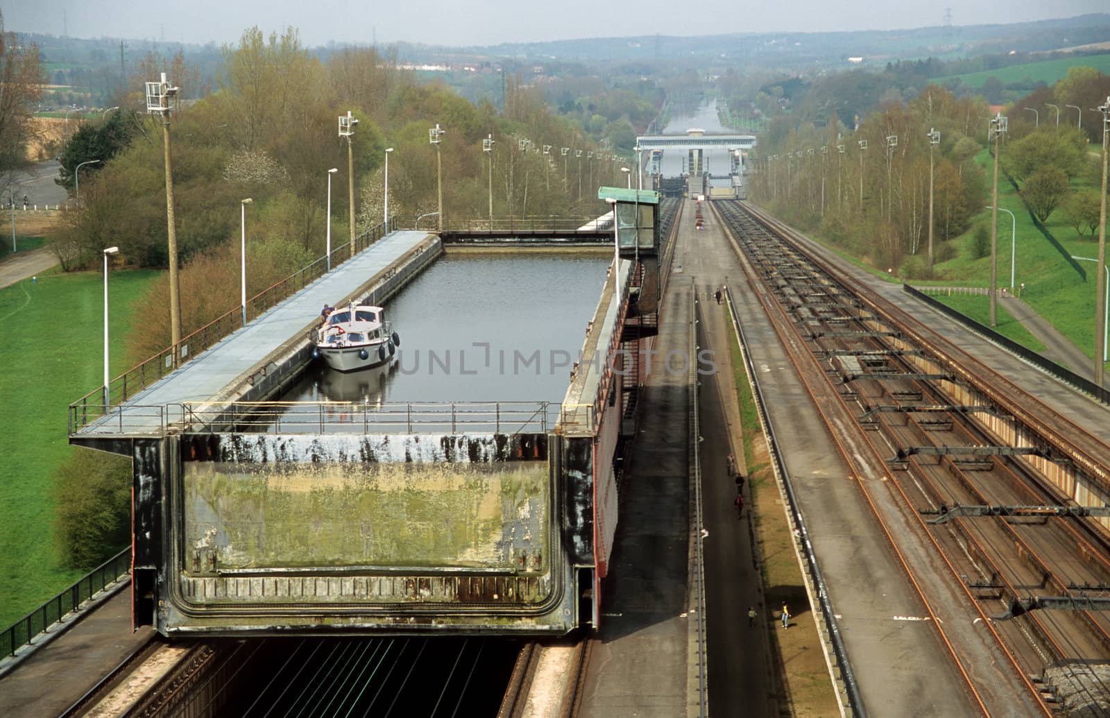 The inclined plane boat lift at Ronquieres, or sloping lock, raises and lowers boats and barges 68m or 223ft in about 90 minutes on the Brussels - Charleroi canal on a system of rails.