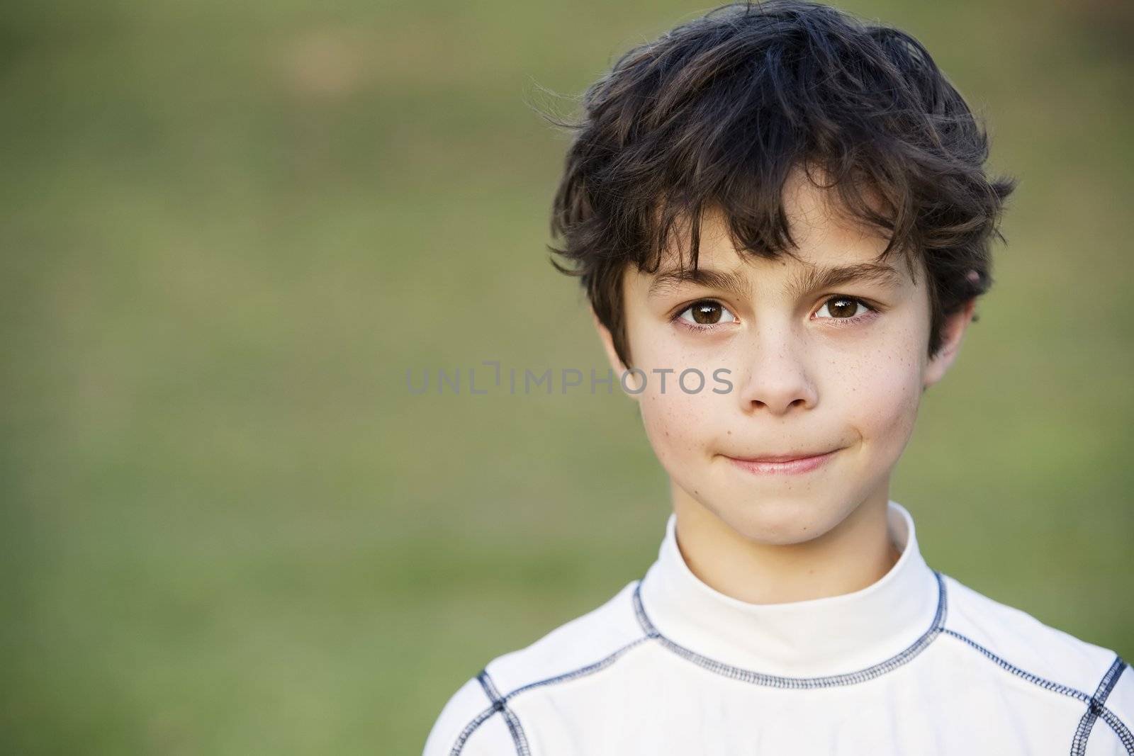 Portrait of a Young Teen Boy with Dark Curly hair