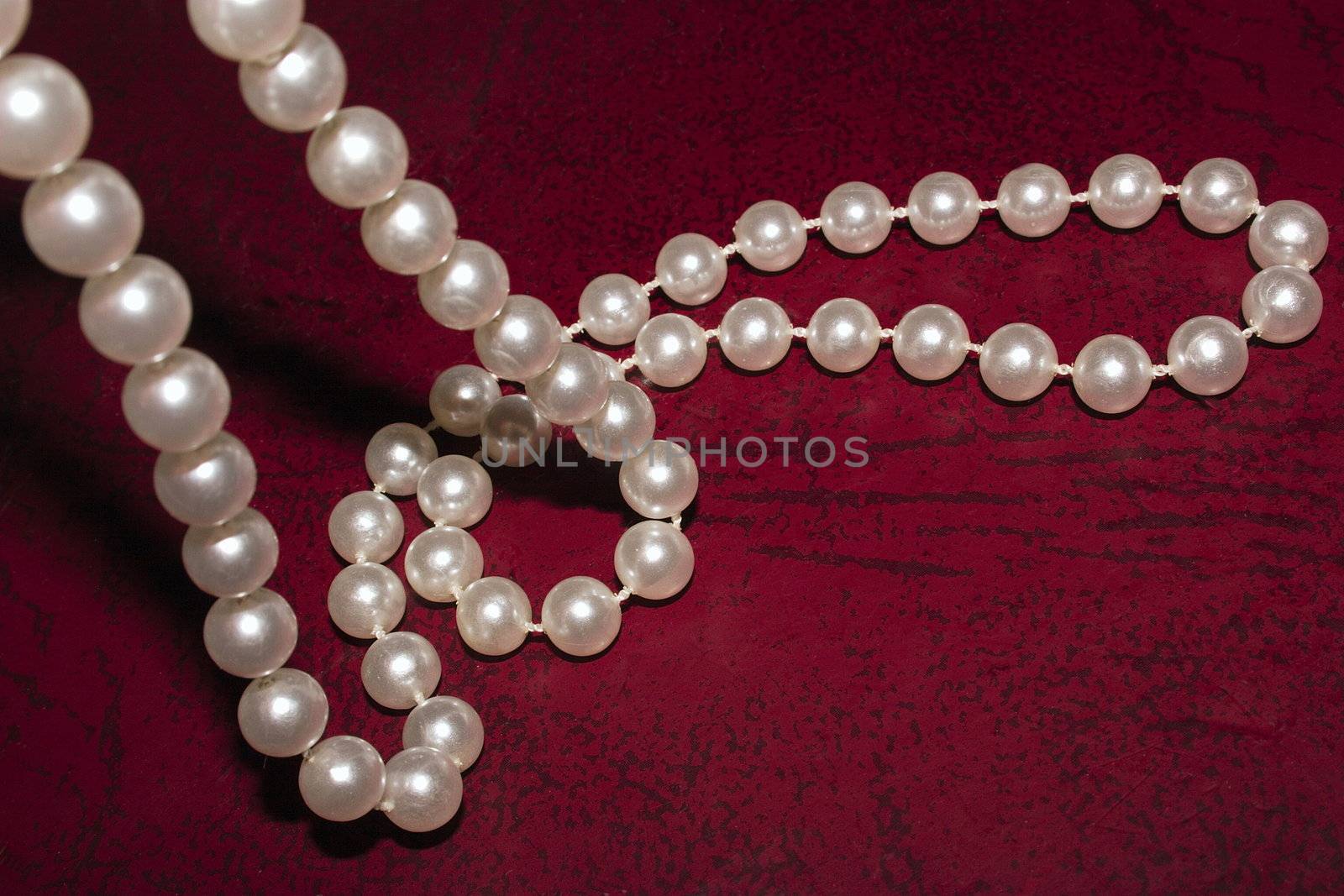 luxurious pearl necklace on a leather background
