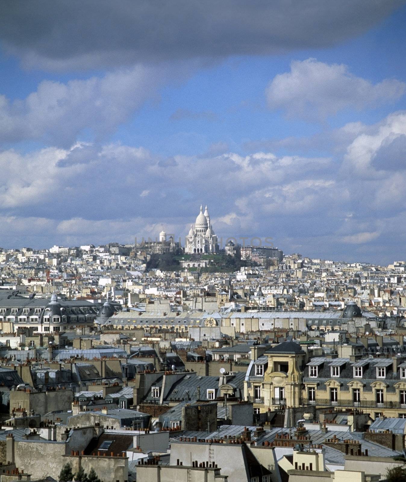 Sacre Coeur on the Paris skyline by ACMPhoto