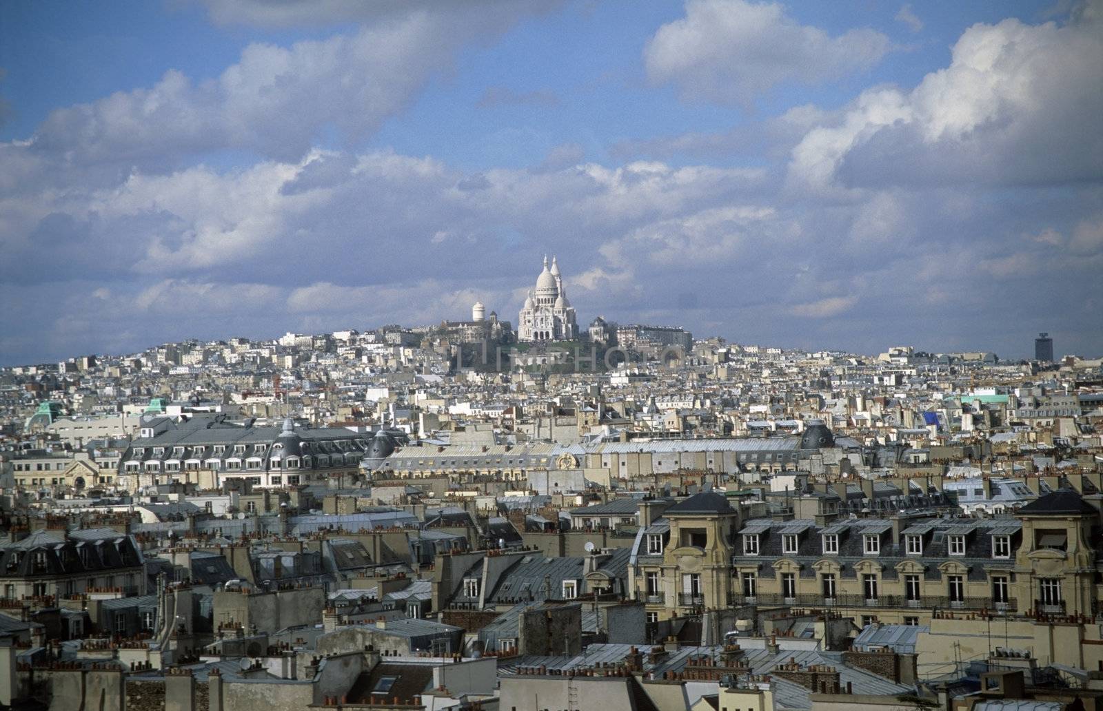 A view of the Sacre Coeur above the Parisian skyline.