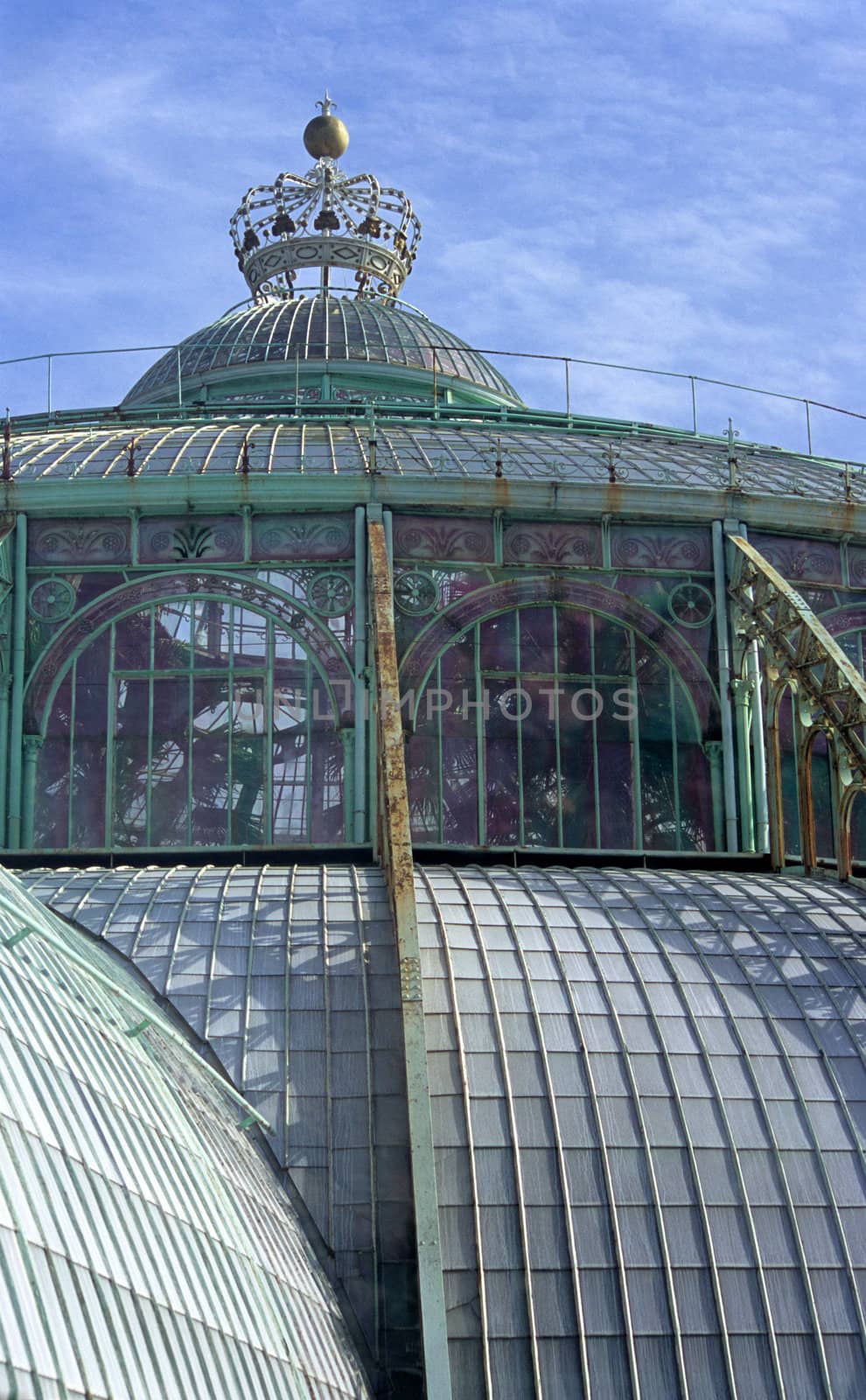 The domed roof of the Royal Greenhouse in Laeken (Brussels), Belgium is topped with a crown.