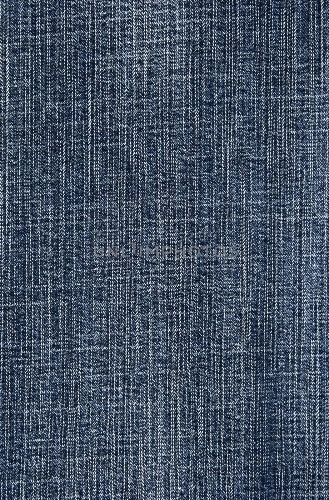 Blue denim fabric background. Close-up of jeans.