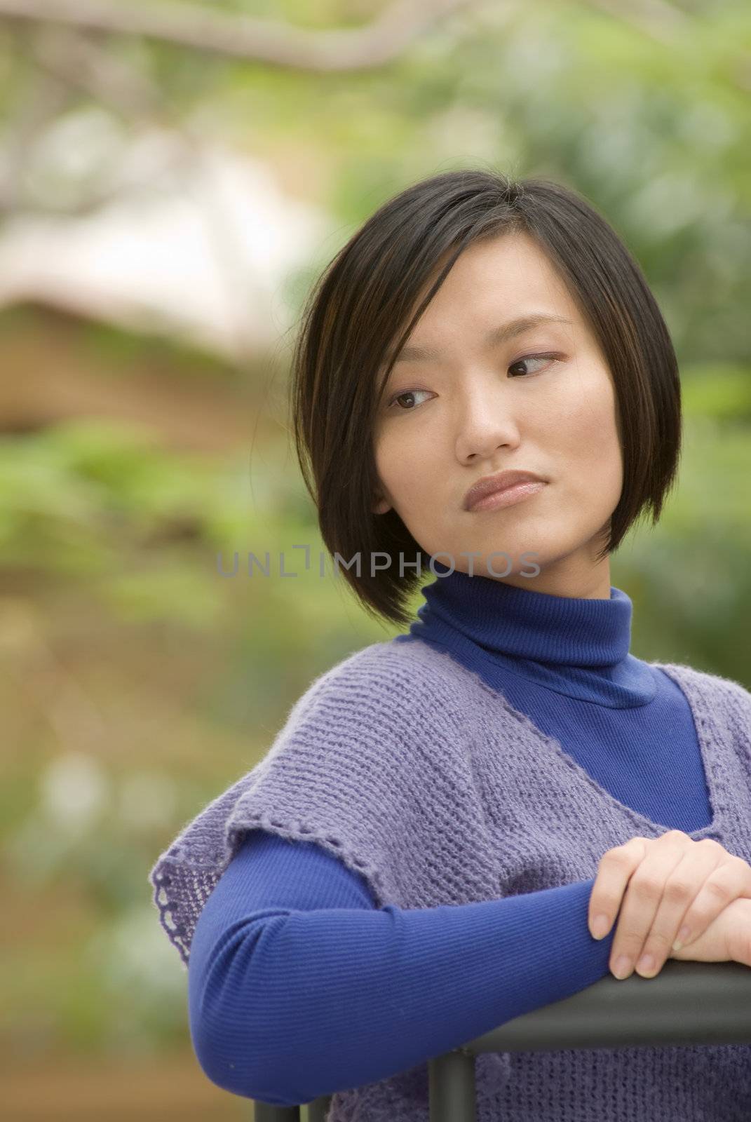 Blue woman portrait wait somebody in outdoor.