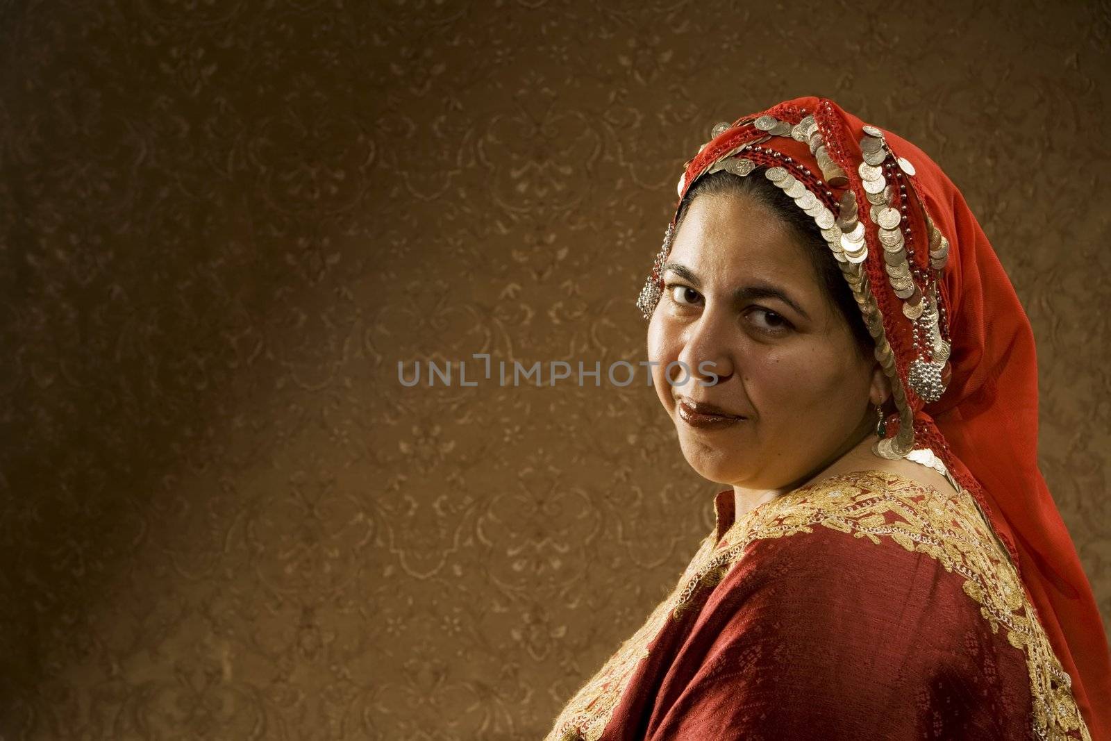 Portrait of a Muslim Woman in a Red Head Scarf