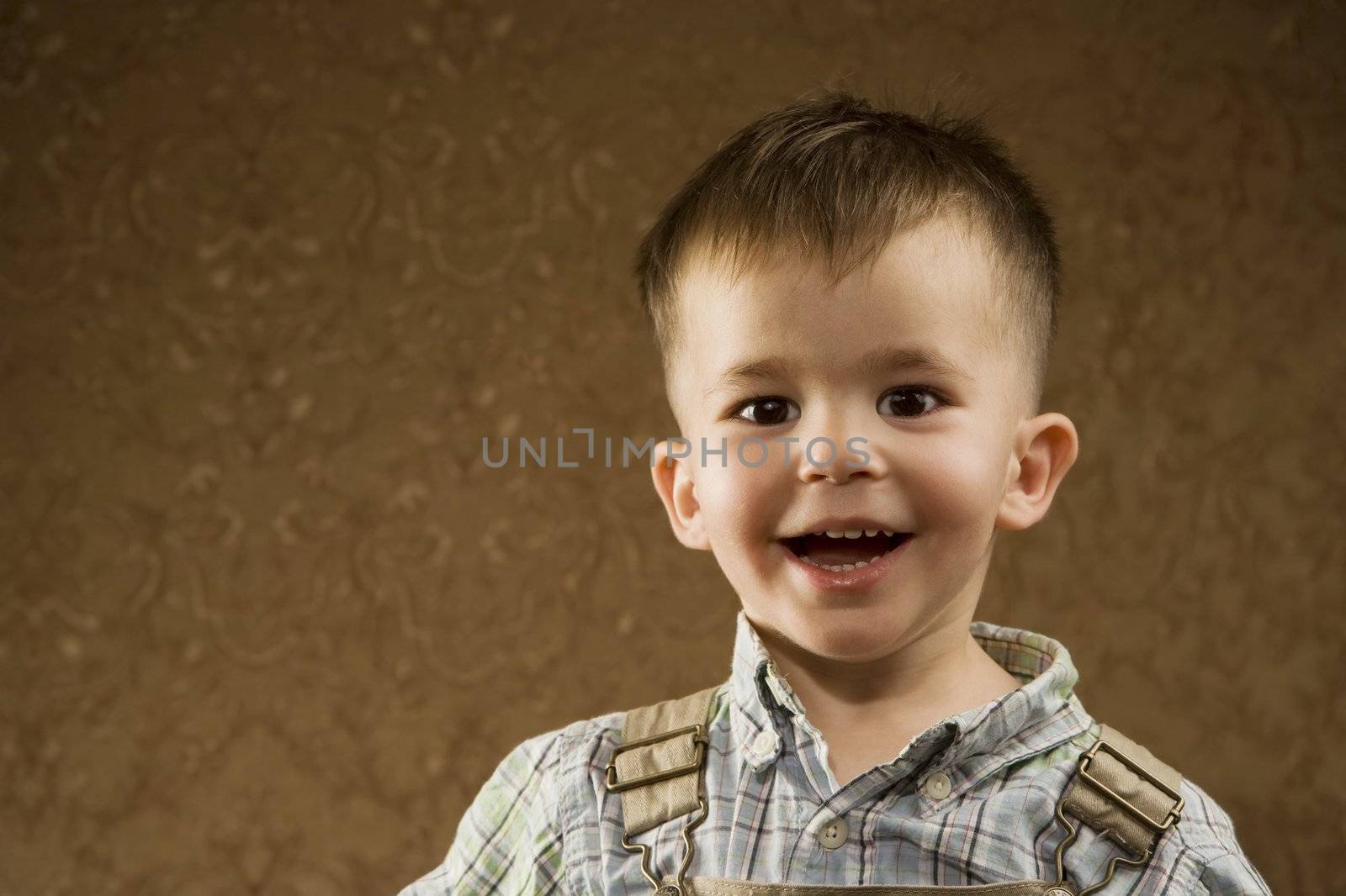 Portrait of a happy young Arabic boy