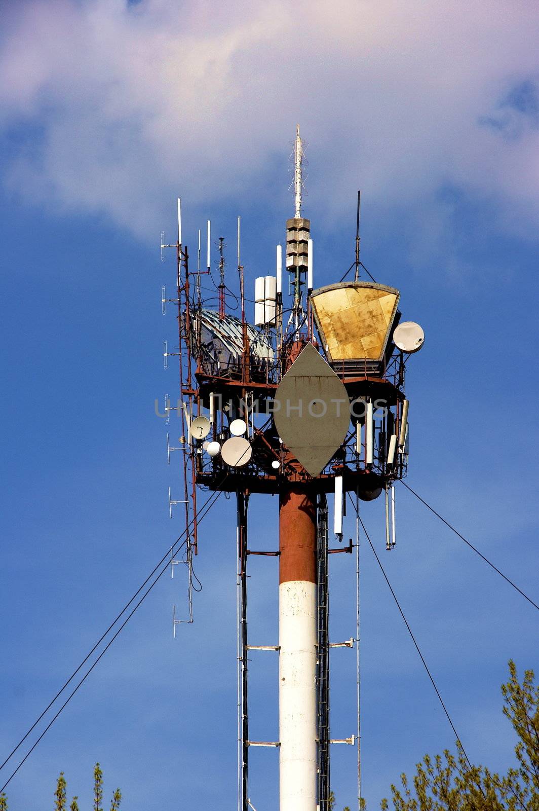 Peak of communication Hi-Tek mast with lights and antennas by fotosergio