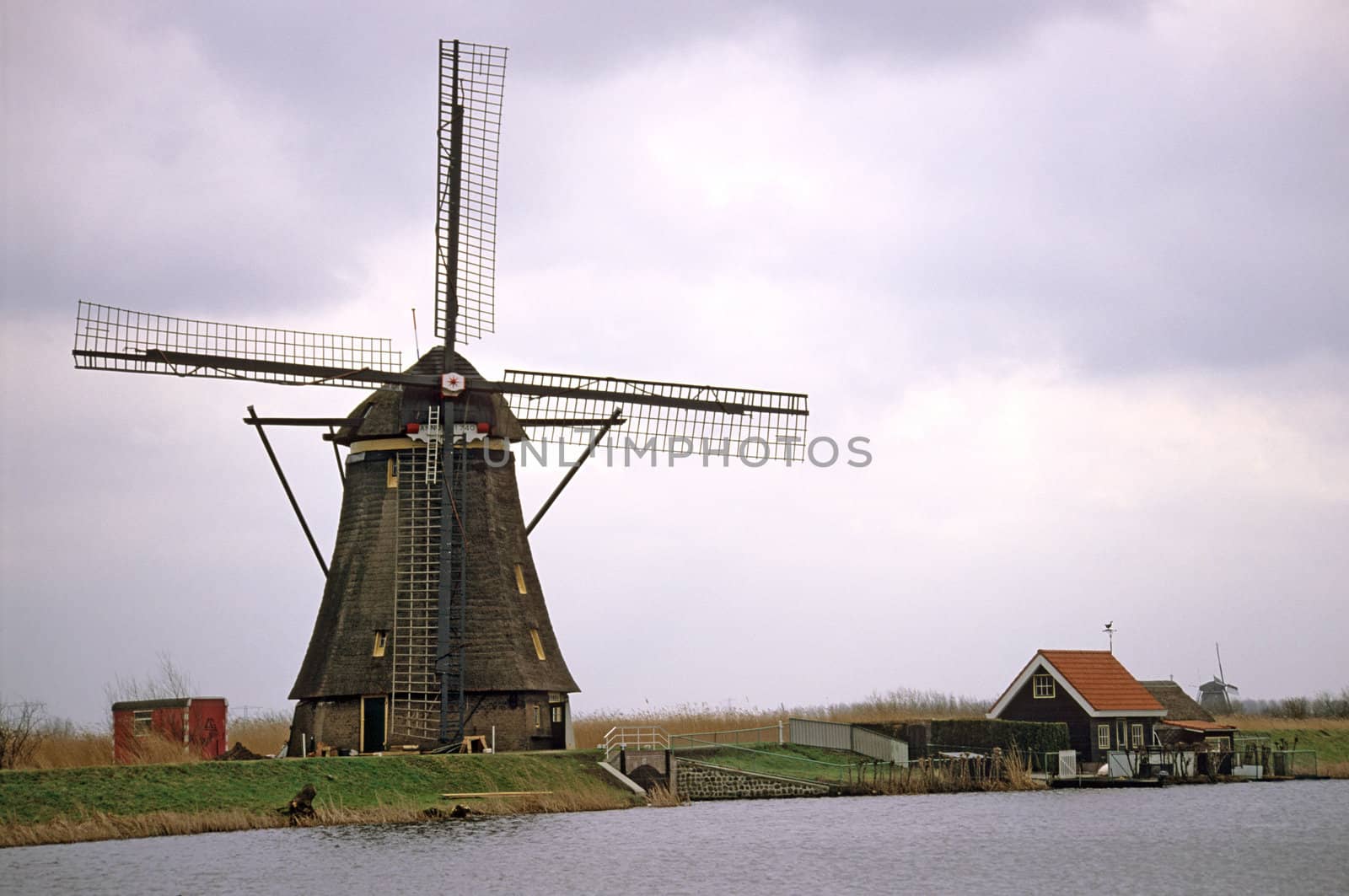 A traditional Dutch windmill at the UNESCO site, Kinderdijk-Elshout in the Netherlands.