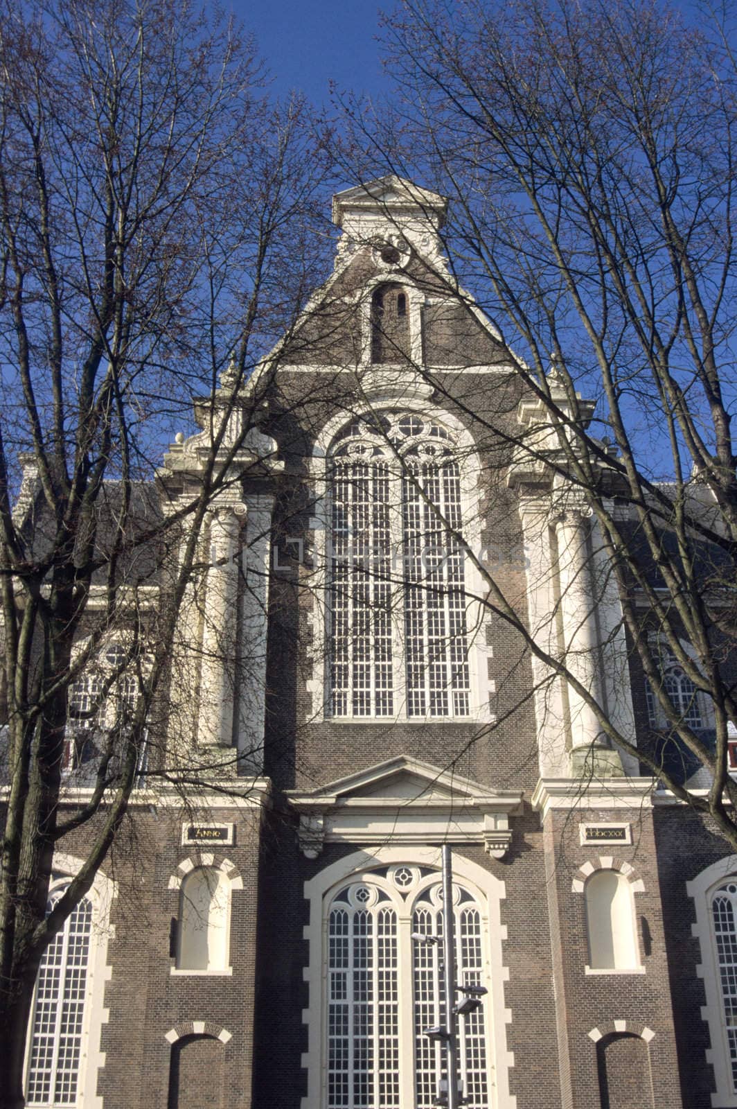 Arched windows of Westerkerk, Western Church, in Amsterdam, The Netherlands.