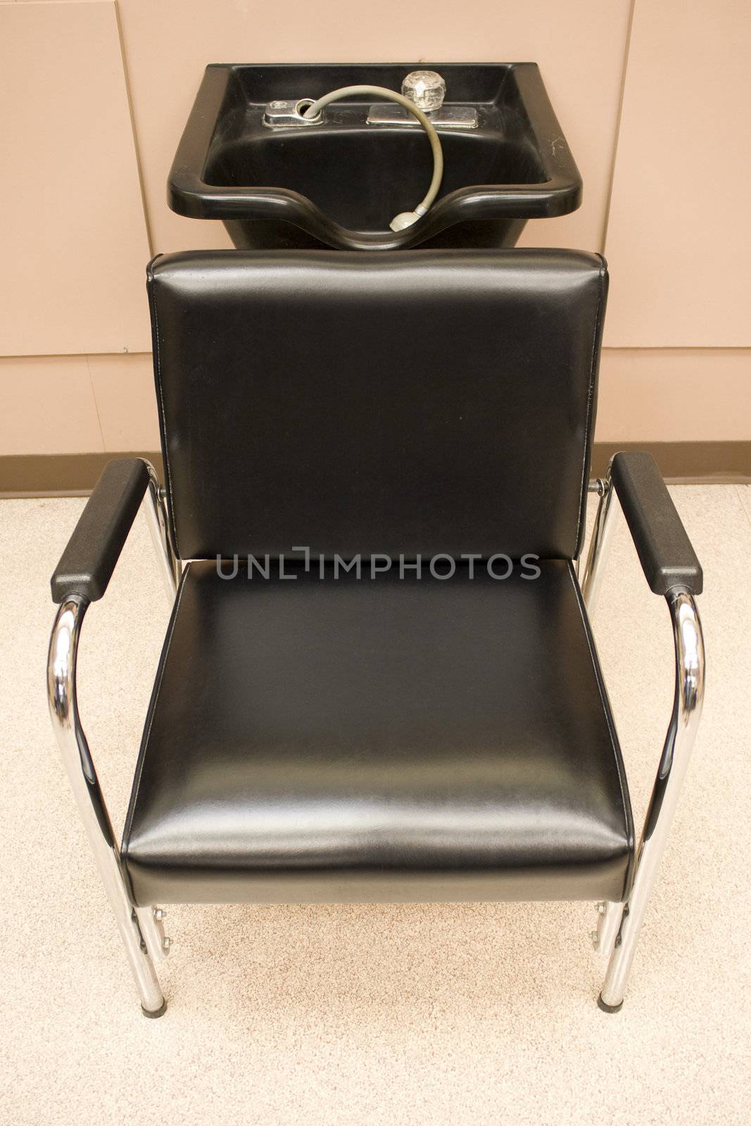 Hair Salon - a hair washing sink and chair.