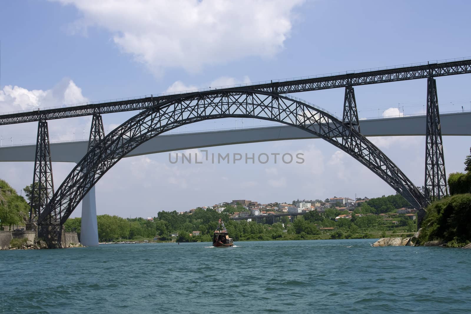 Big bridge over river Duru in the city Porto