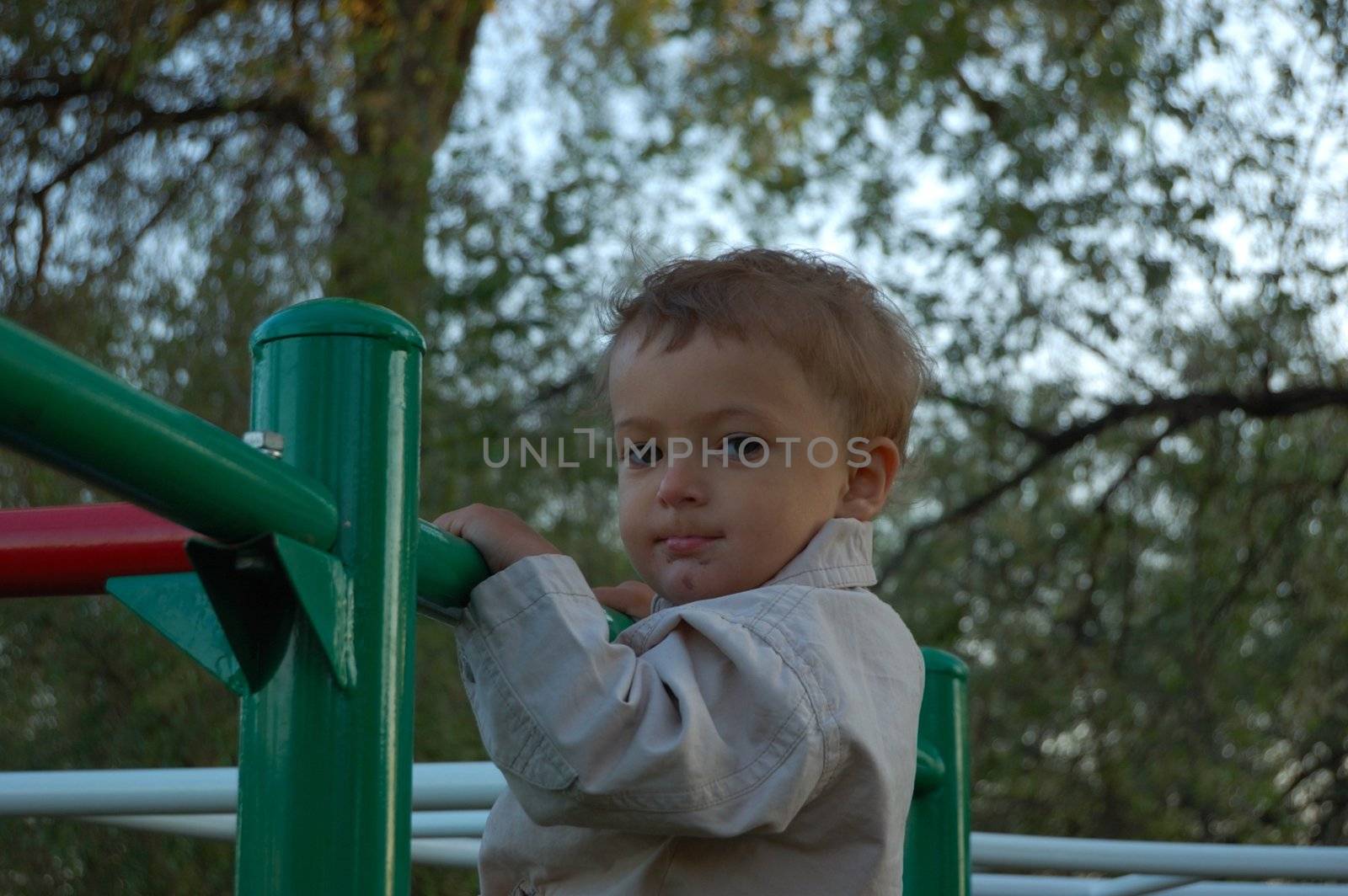 Happy childhood. Little boy at playground